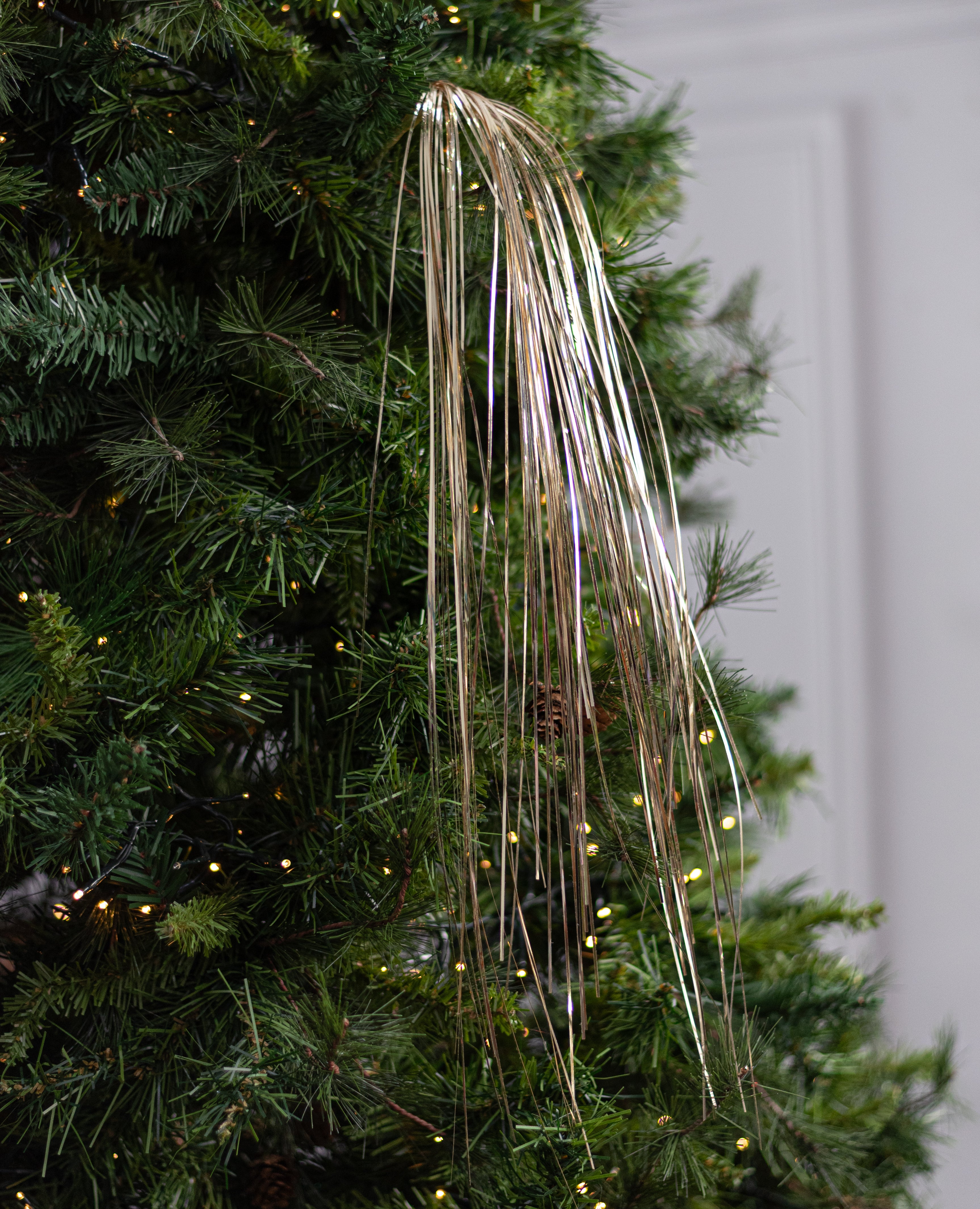32" Hanging Tinsel Spray: Metallic Champagne Gold