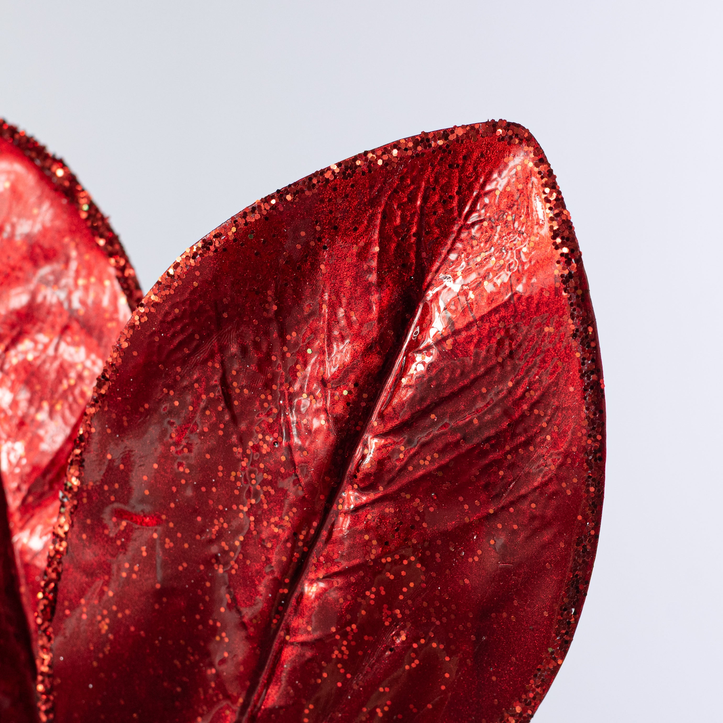 24" Metallic Magnolia Leaves Spray: Red