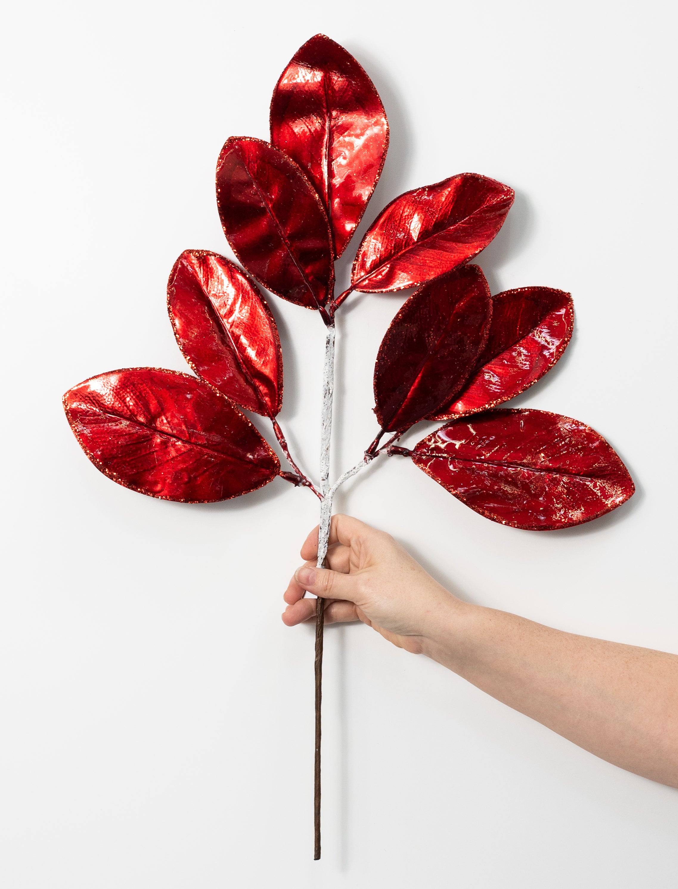 24" Metallic Magnolia Leaves Spray: Red