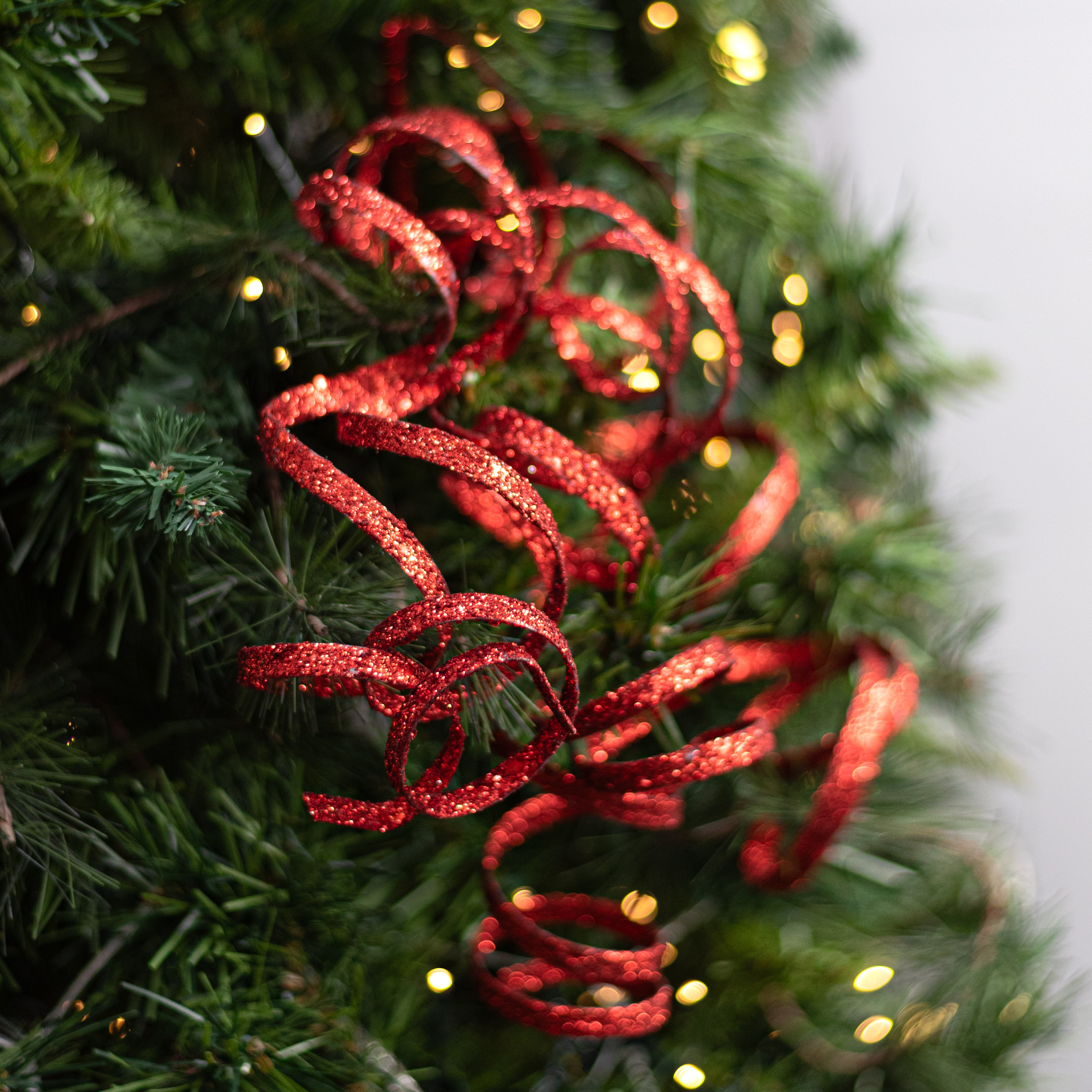 31" Curly Glitter Ribbon Spray: Red