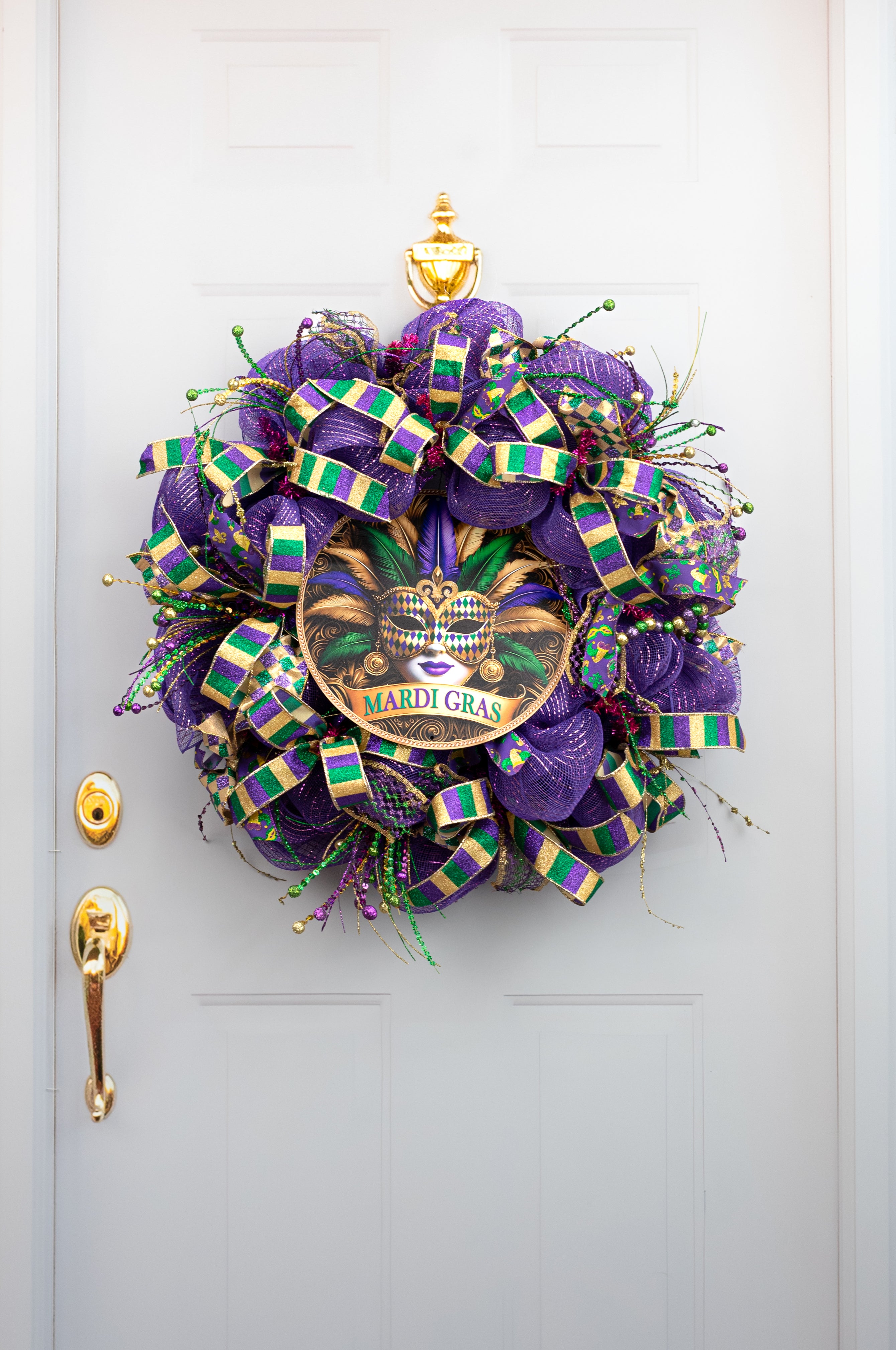 12" Metal Sign: Gilded Mardi Gras Feather Mask