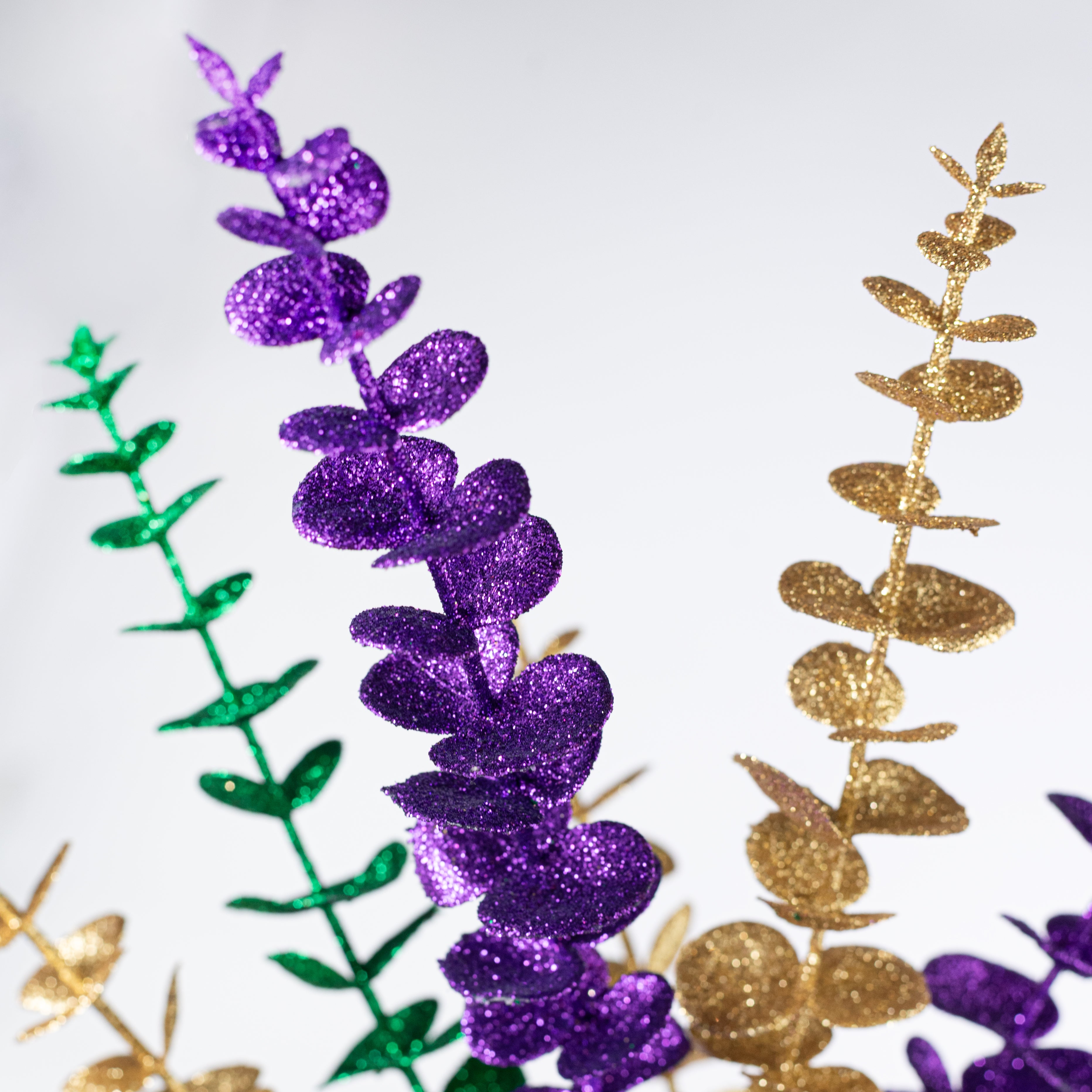 27" Glittered Eucalyptus Spray: Mardi Gras