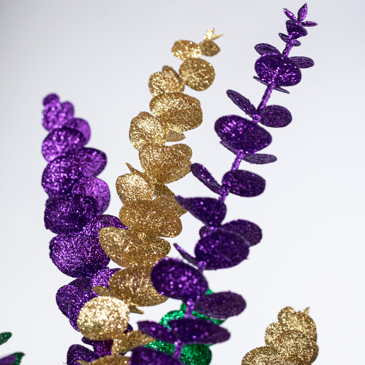 27" Glittered Eucalyptus Spray: Mardi Gras