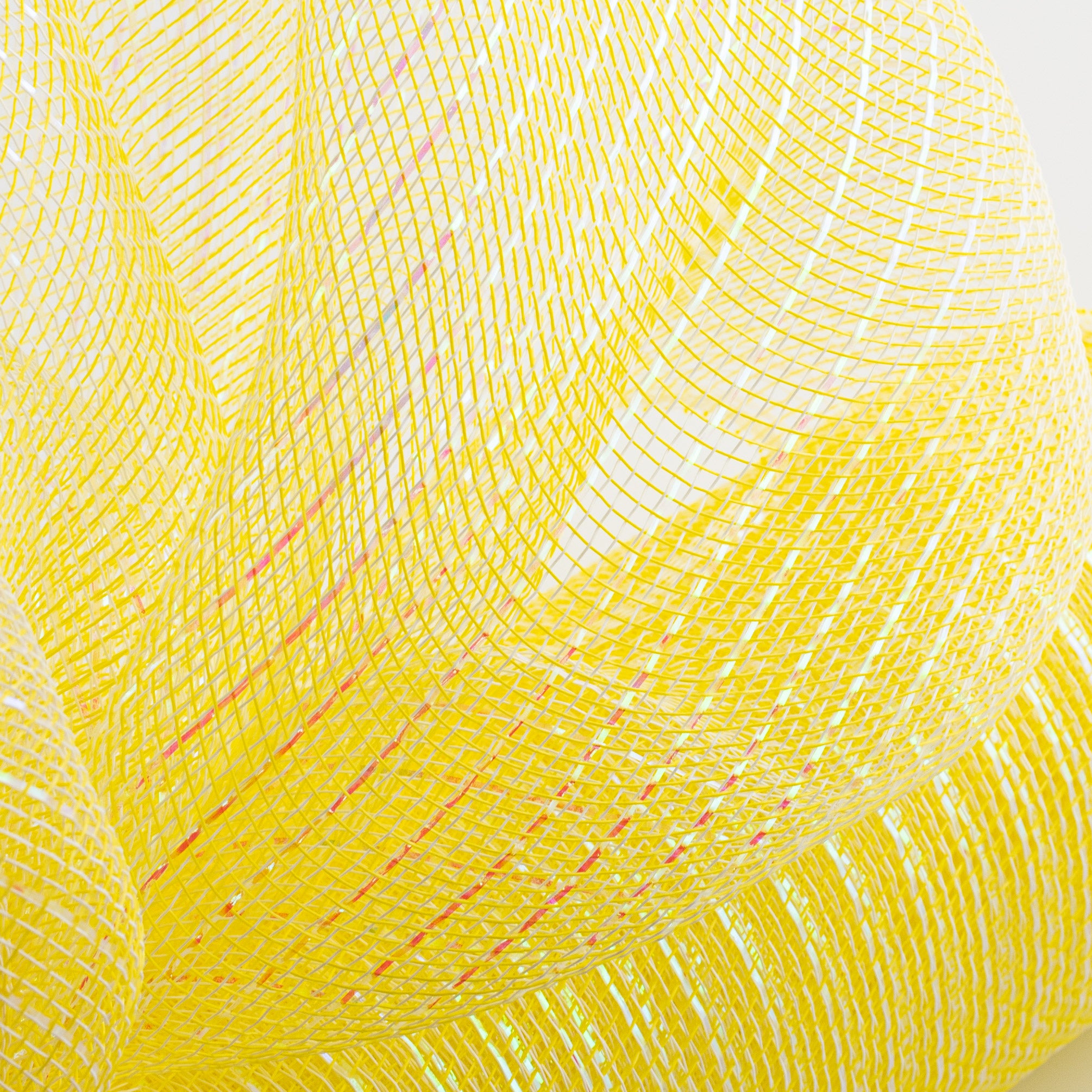21" Iridescent Foil Mesh: Pastel Yellow & White Lifestyle Photo