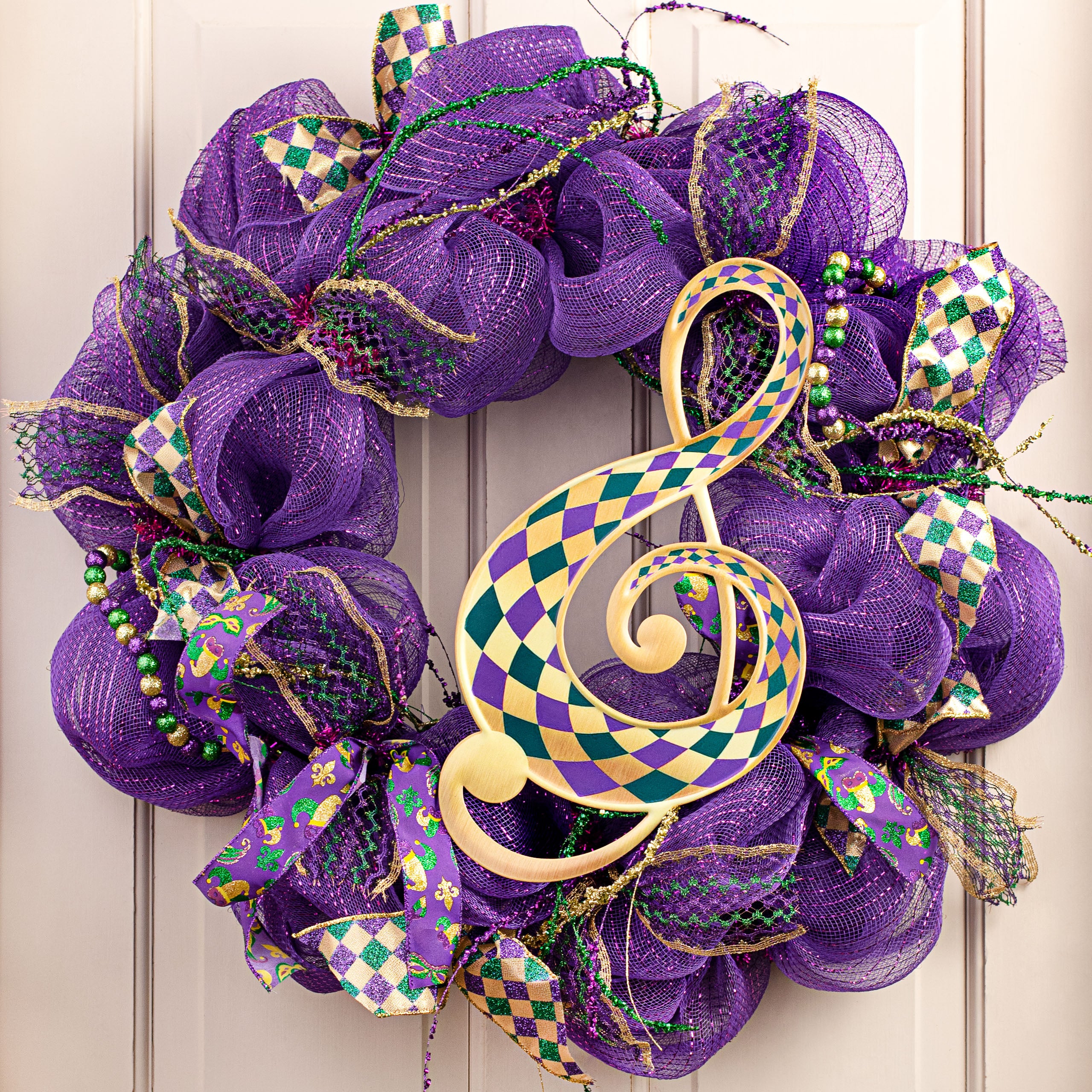 16" Metal Embossed Hanger: Mardi Gras Harlequin Treble Clef Lifestyle Photo