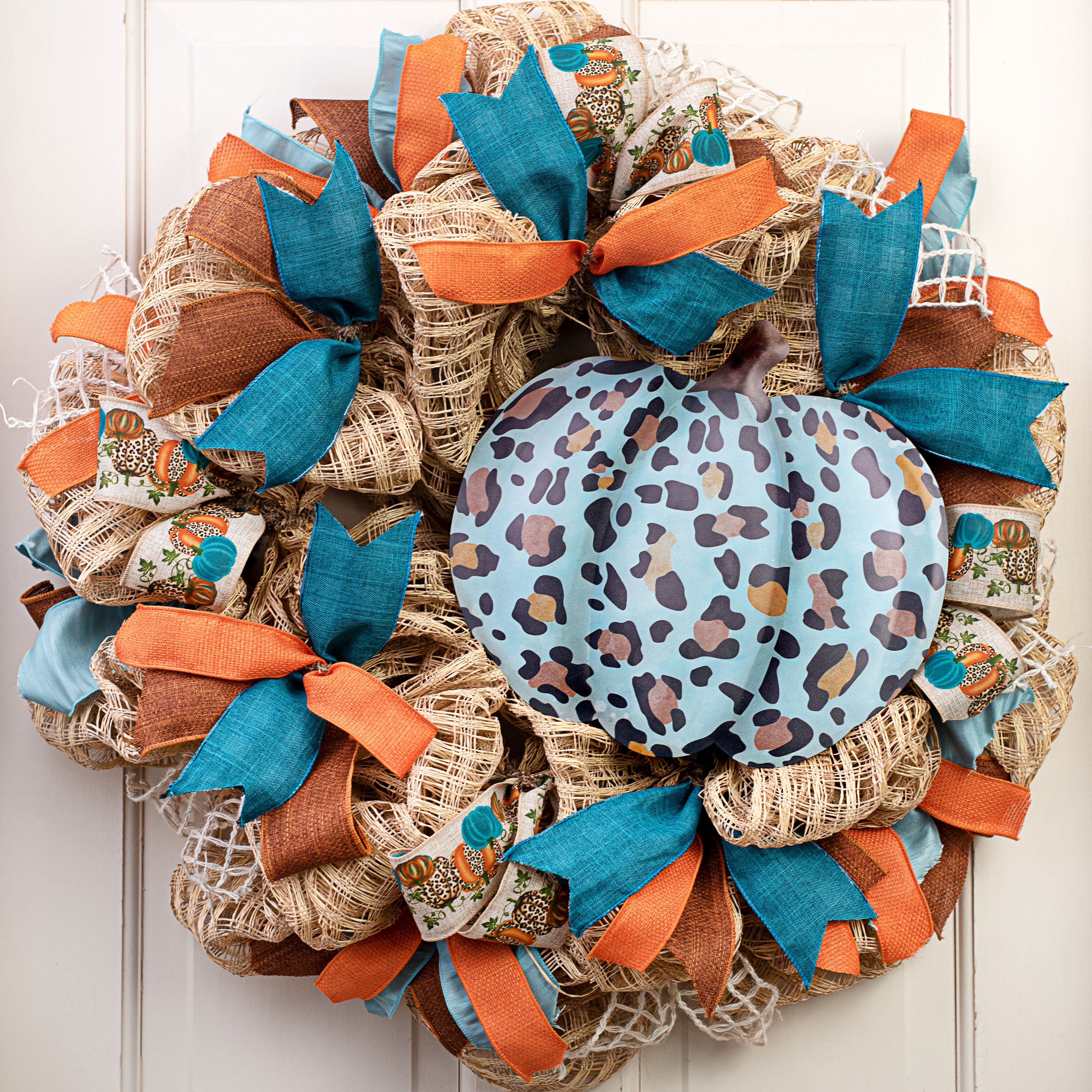 12" Metal Embossed Hanger: Teal Leopard Pumpkin Lifestyle Photo