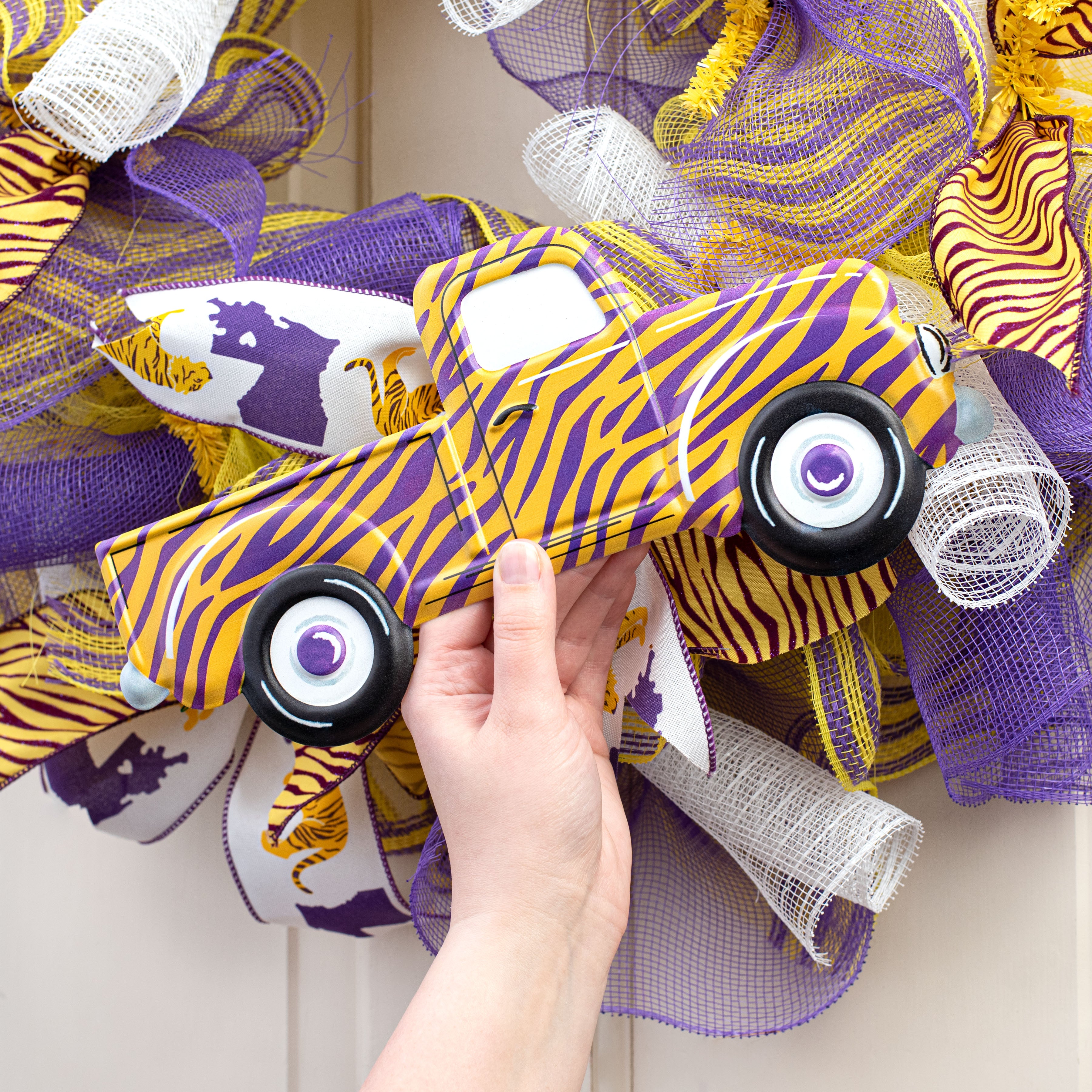 12" Metal Embossed Hanger: Yellow & Purple Animal Stripe Truck Lifestyle Photo