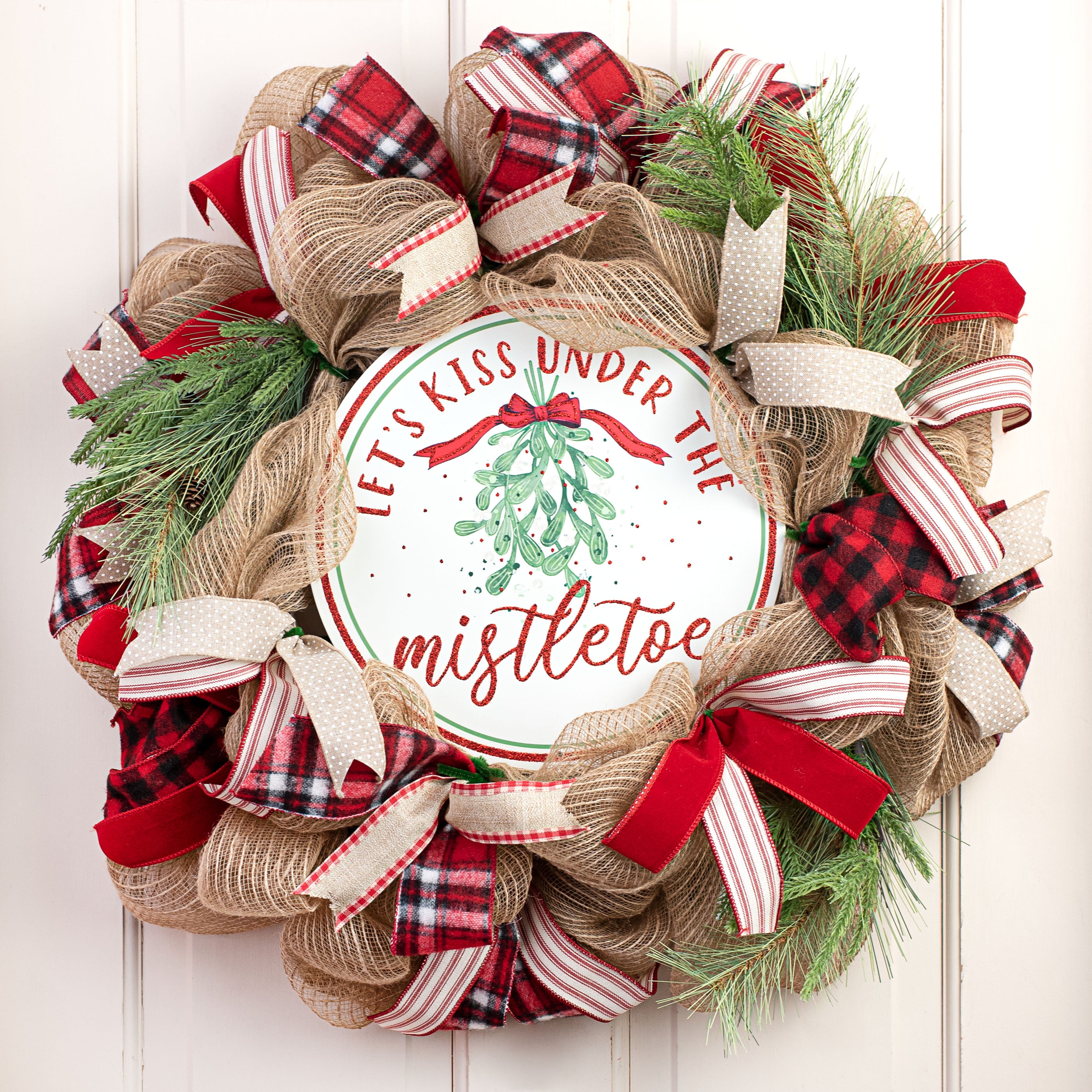 12" Metal Sign: Let's Kiss Under The Mistletoe Lifestyle Photo
