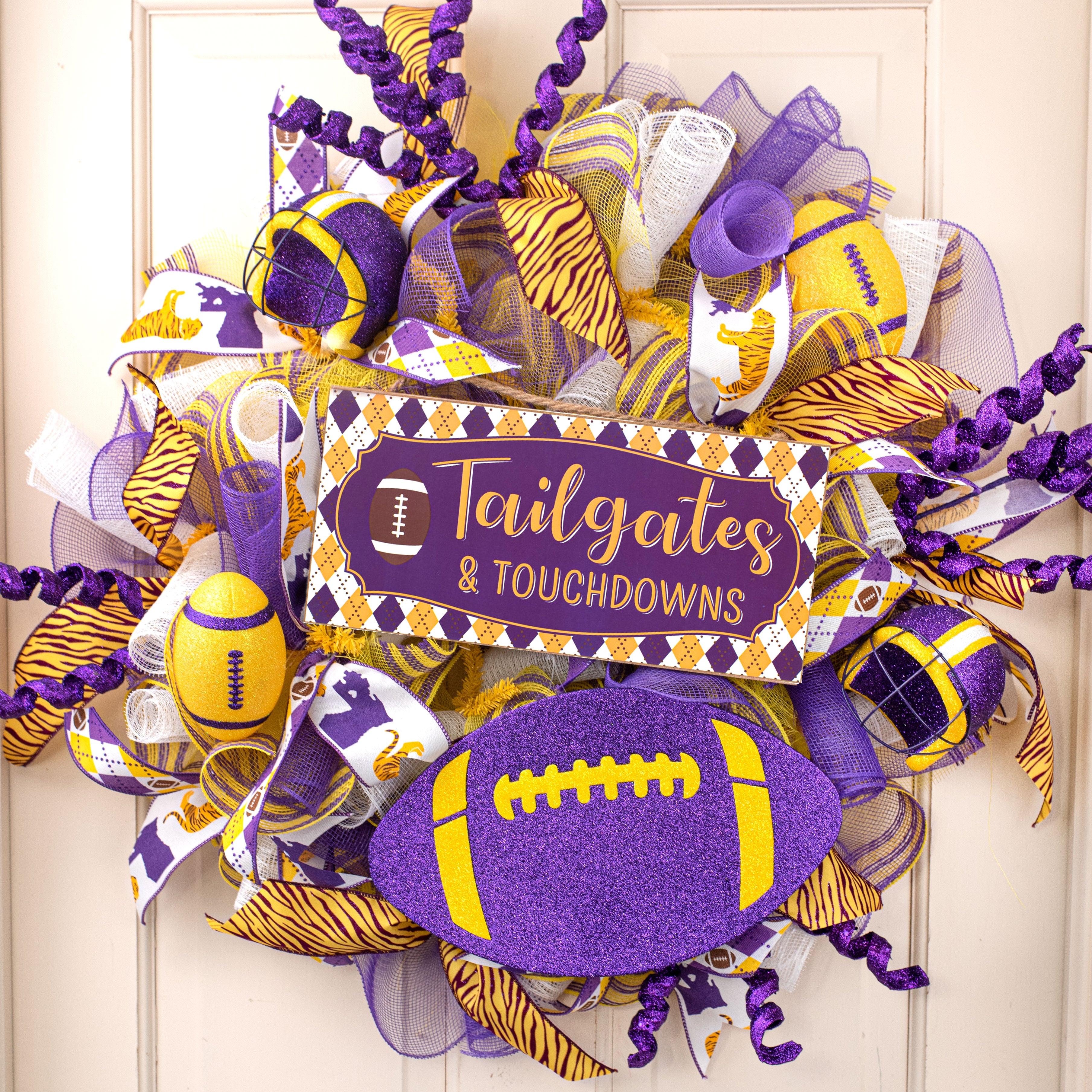 4.5" Metallic Glitter Football Ornament: Yellow & Purple Lifestyle Photo