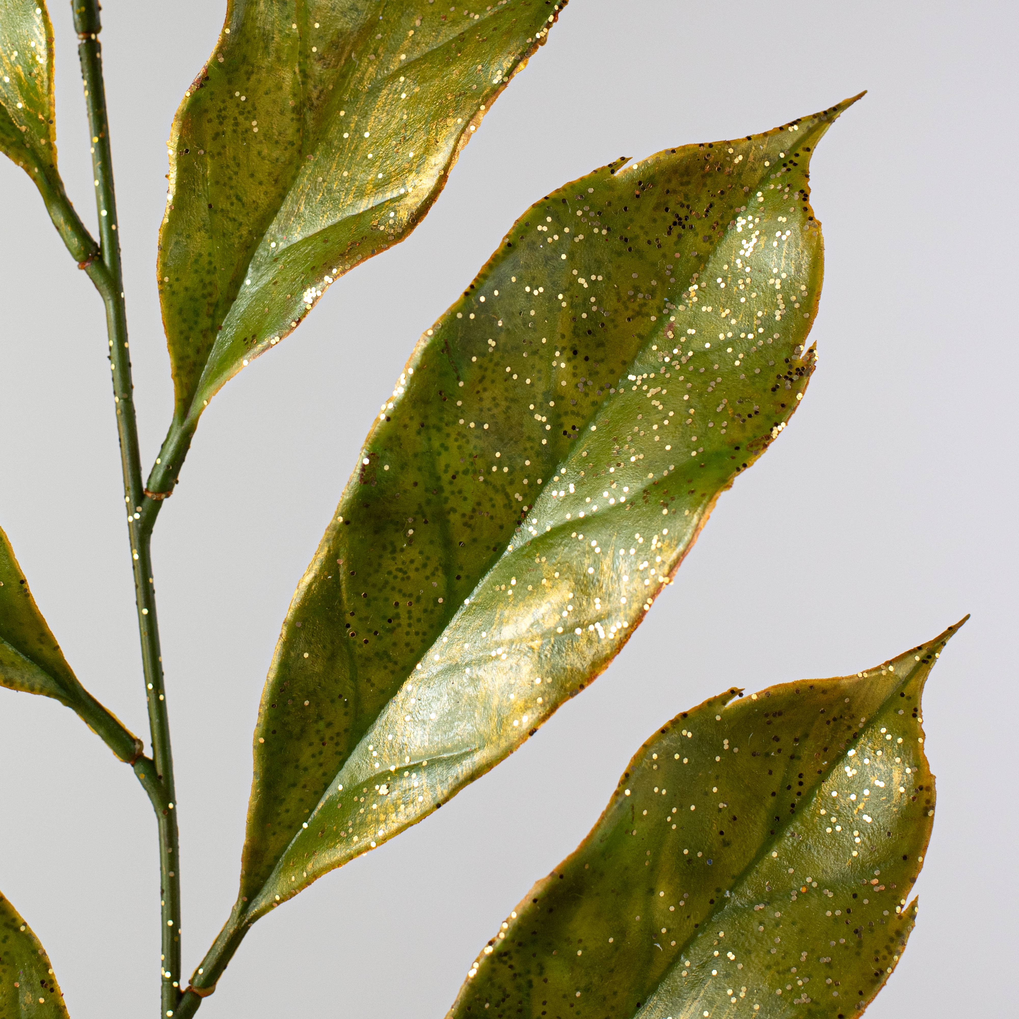 28" Metallic Magnolia Leaves Spray: Green & Gold Lifestyle Photo