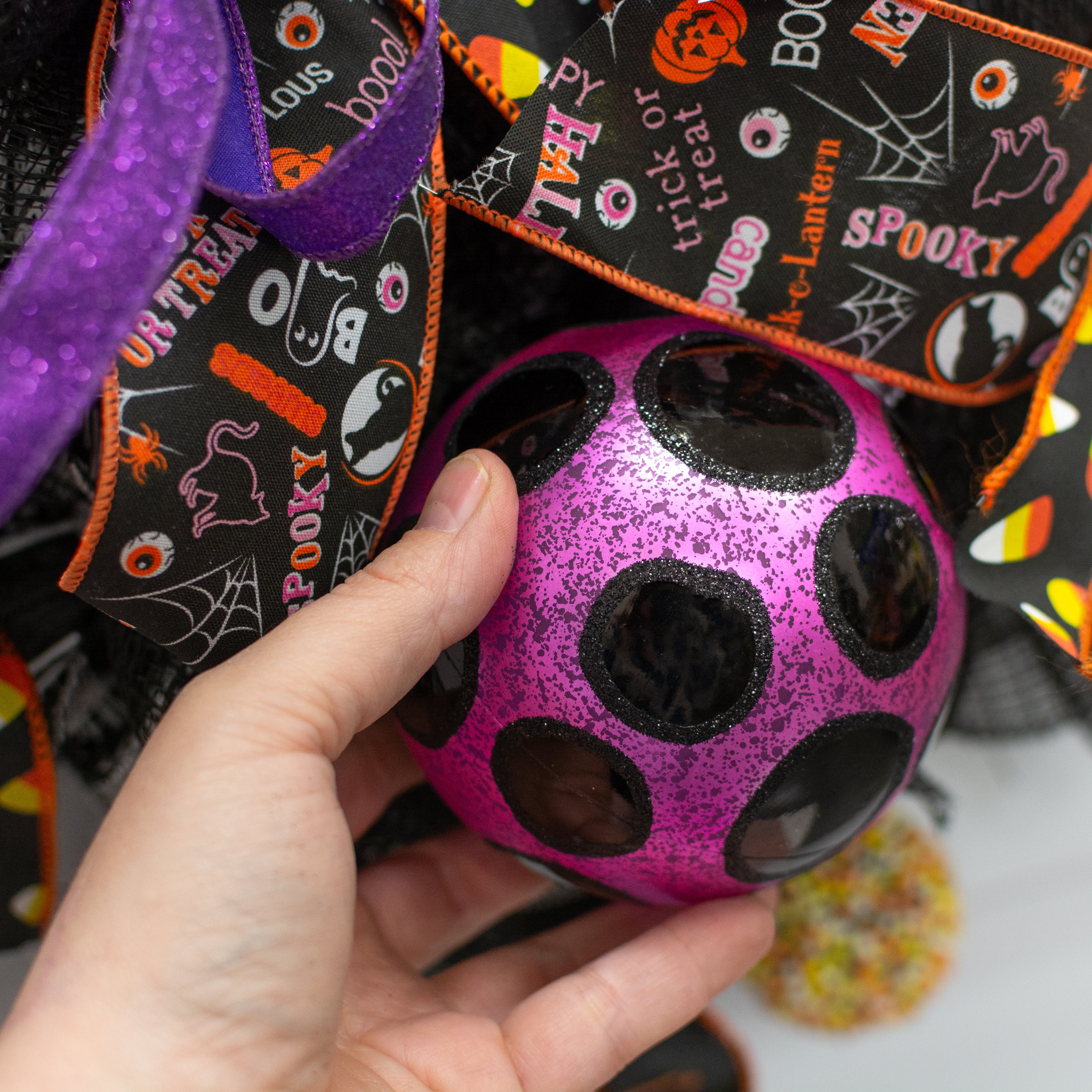 100mm Antiqued Dots Ornament: Fuchsia Pink & Black Lifestyle Photo