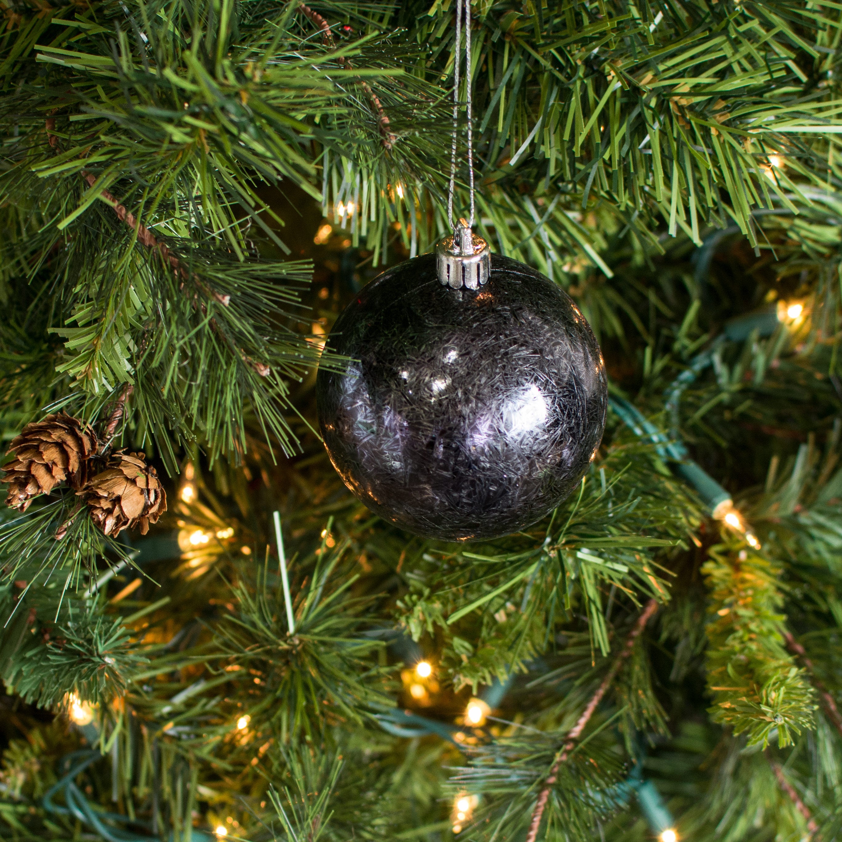 80MM Feather Smooth Ball Ornament: Black Lifestyle Photo