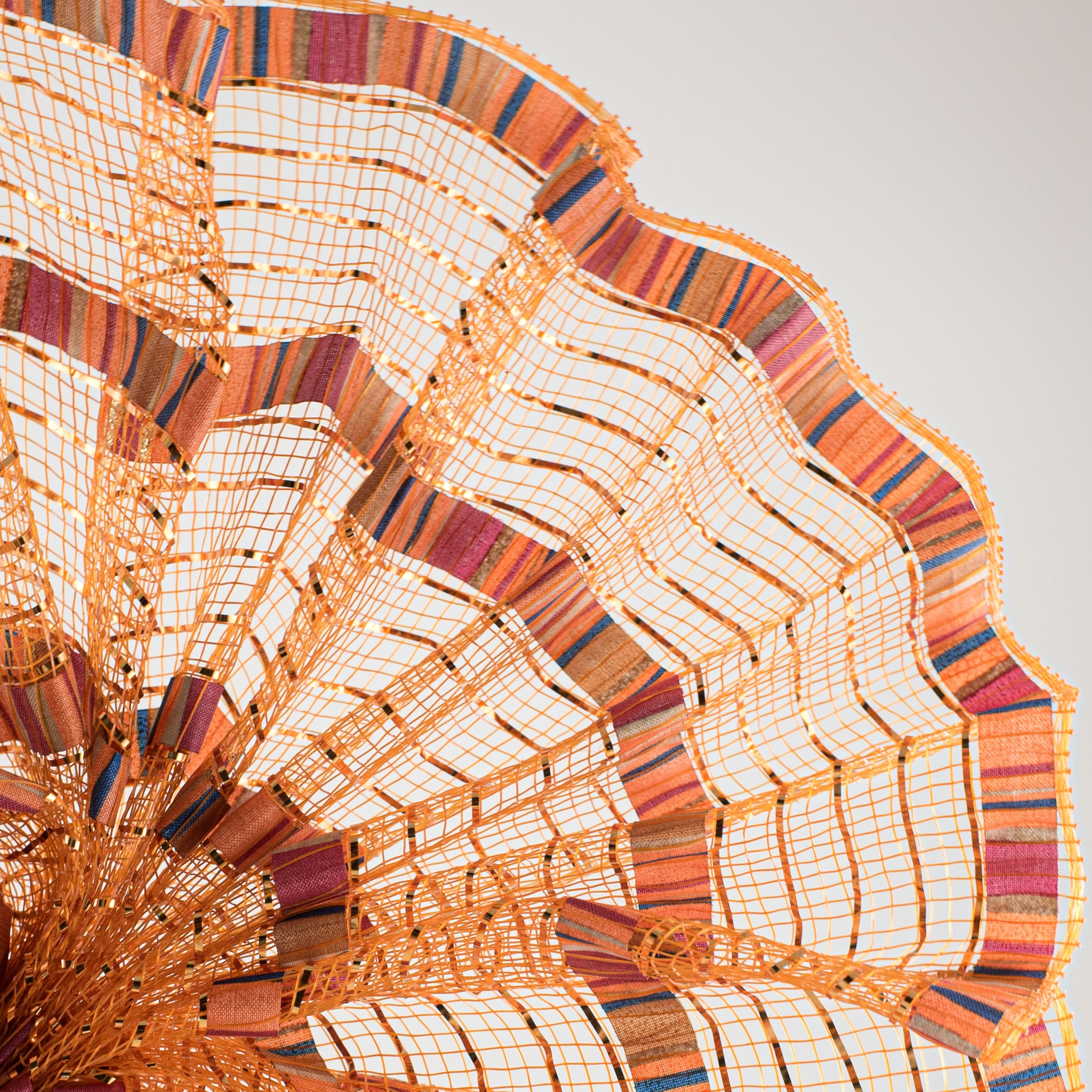 10" Patterned Mesh: Rust Metallic & Fall Print Lifestyle Photo