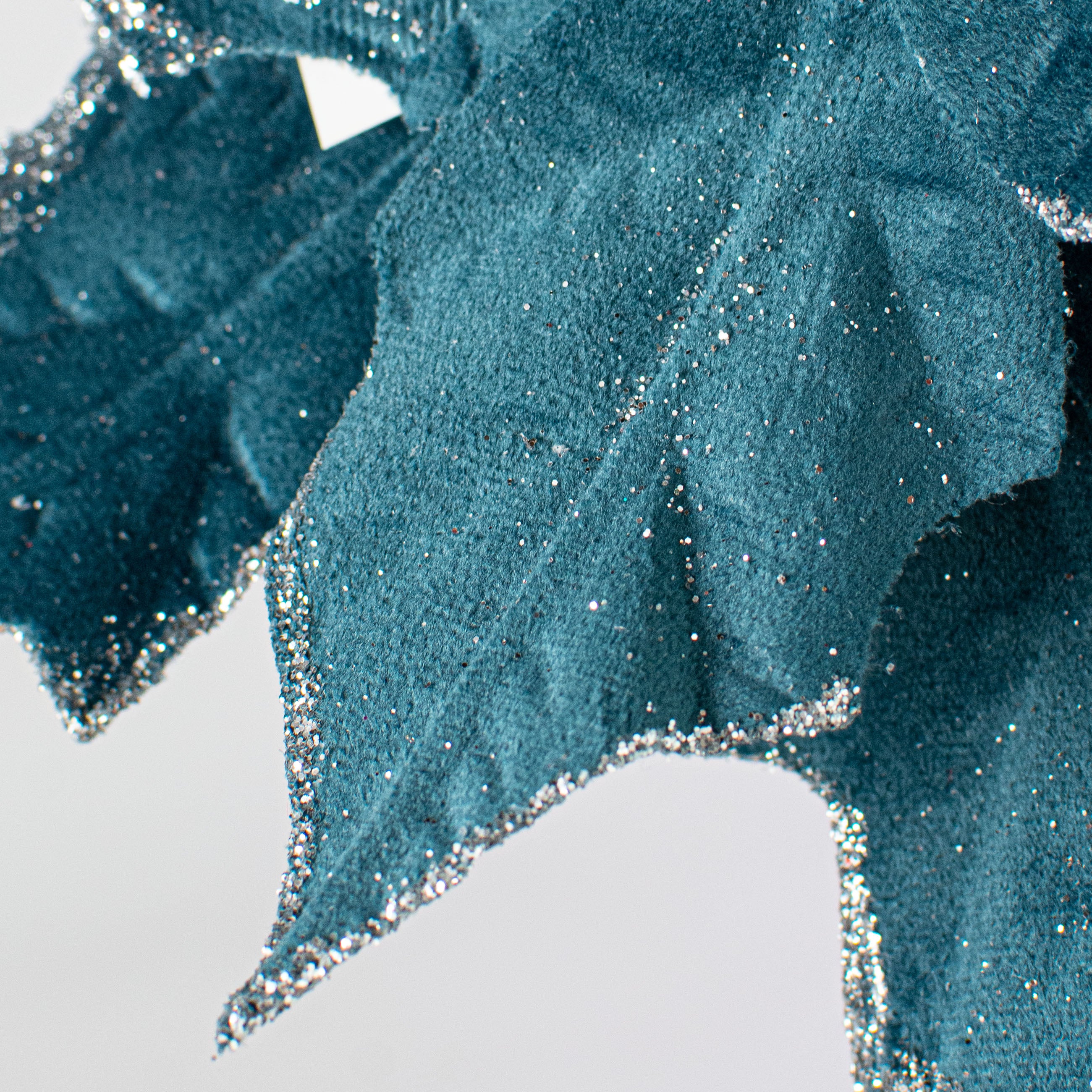 12" Poinsettia Stem: Teal Blue Lifestyle Photo