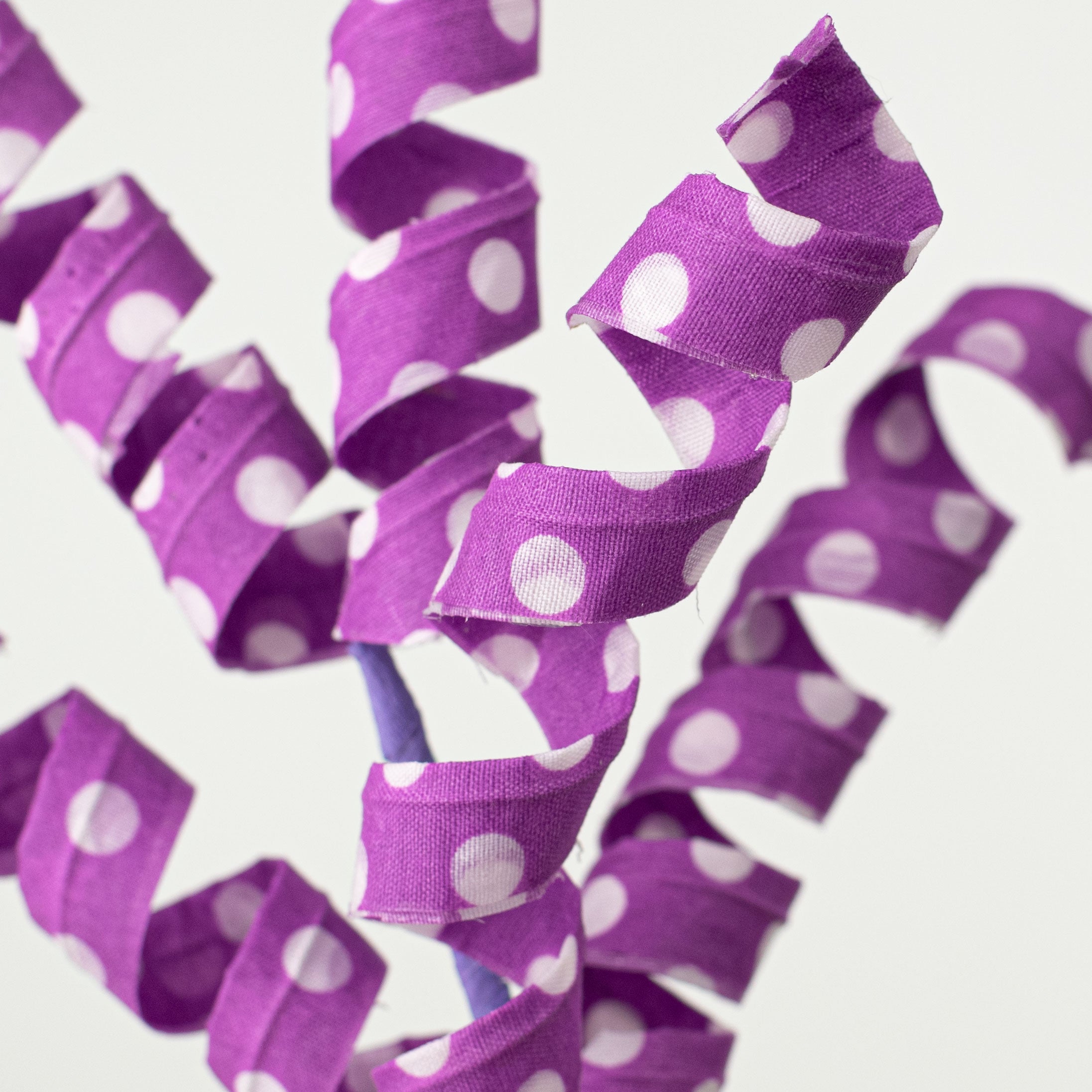 16" Polka Dot Curly Pick: Purple Lifestyle Photo