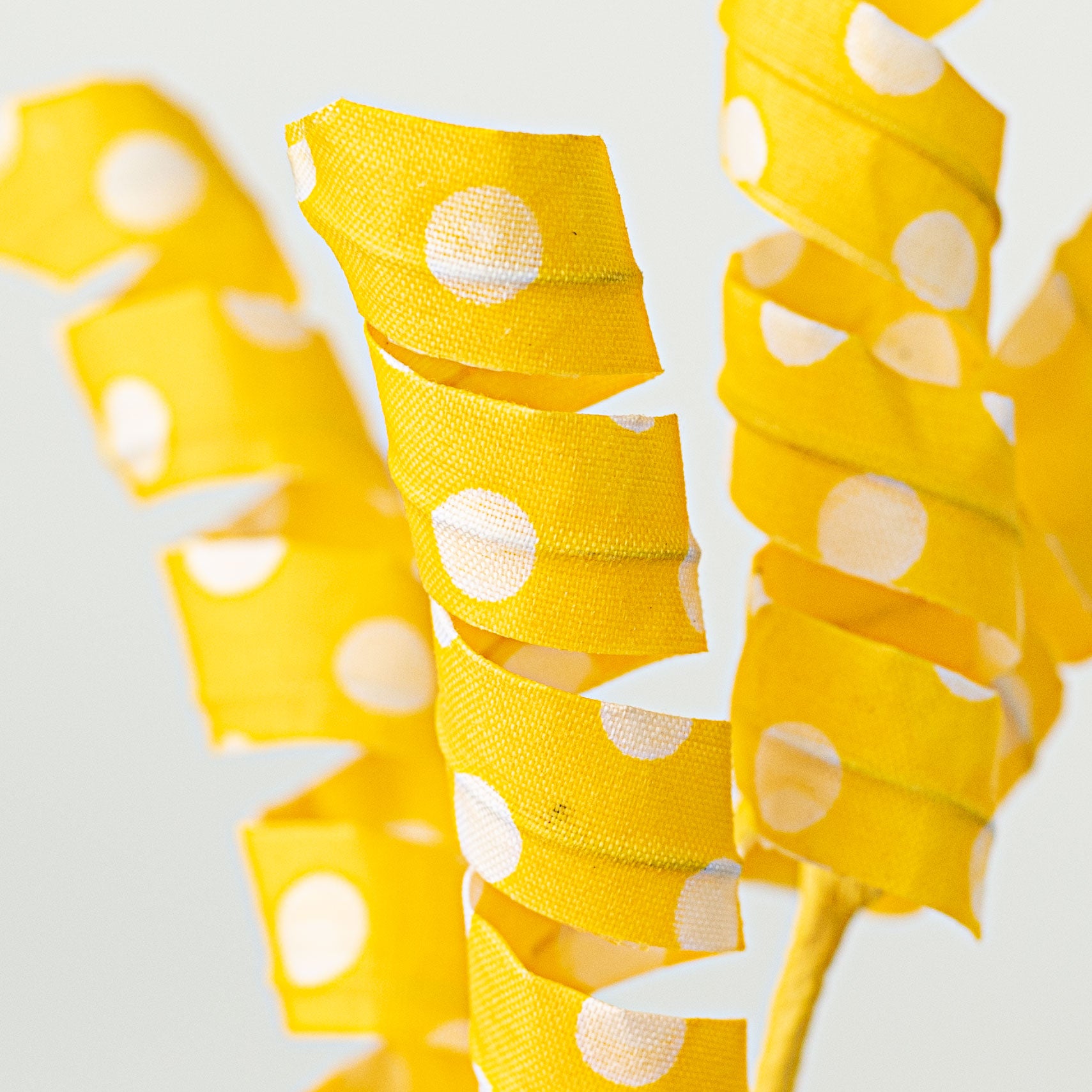 16" Polka Dot Curly Pick: Yellow Lifestyle Photo