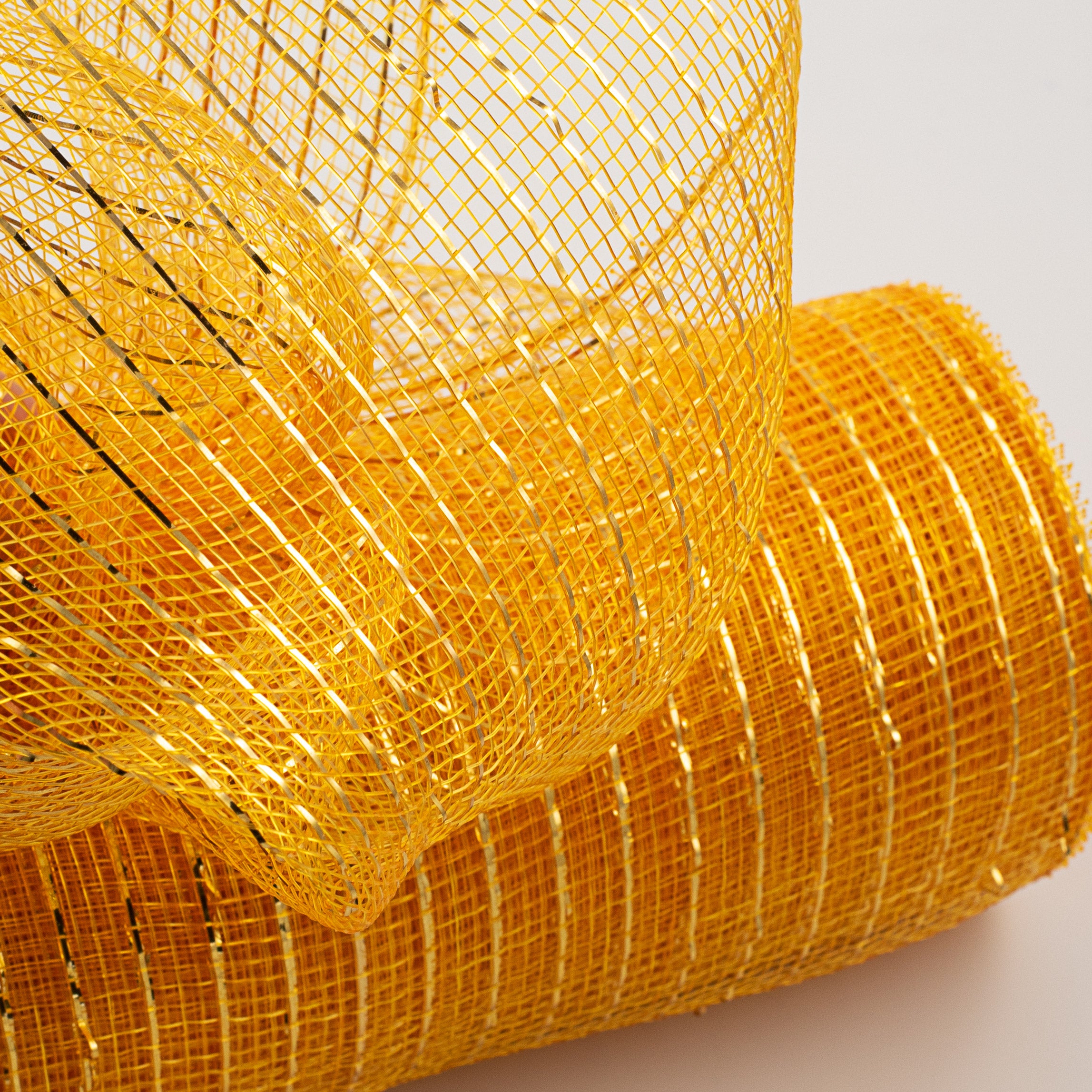 10" Poly Deco Mesh: Metallic Bright Gold Lifestyle Photo