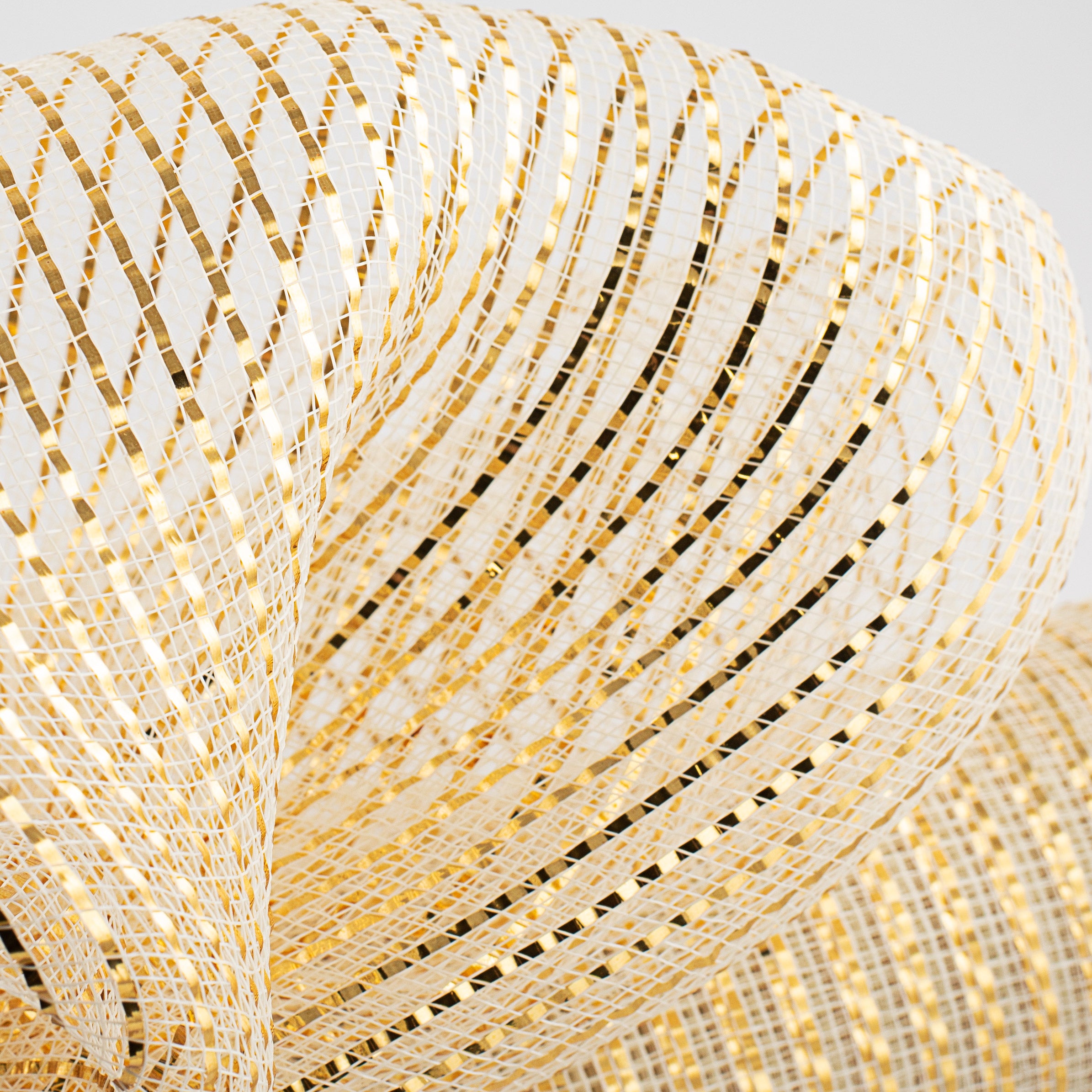 21" Poly Deco Mesh: Wide Foil Metallic Gold With Cream Lifestyle Photo