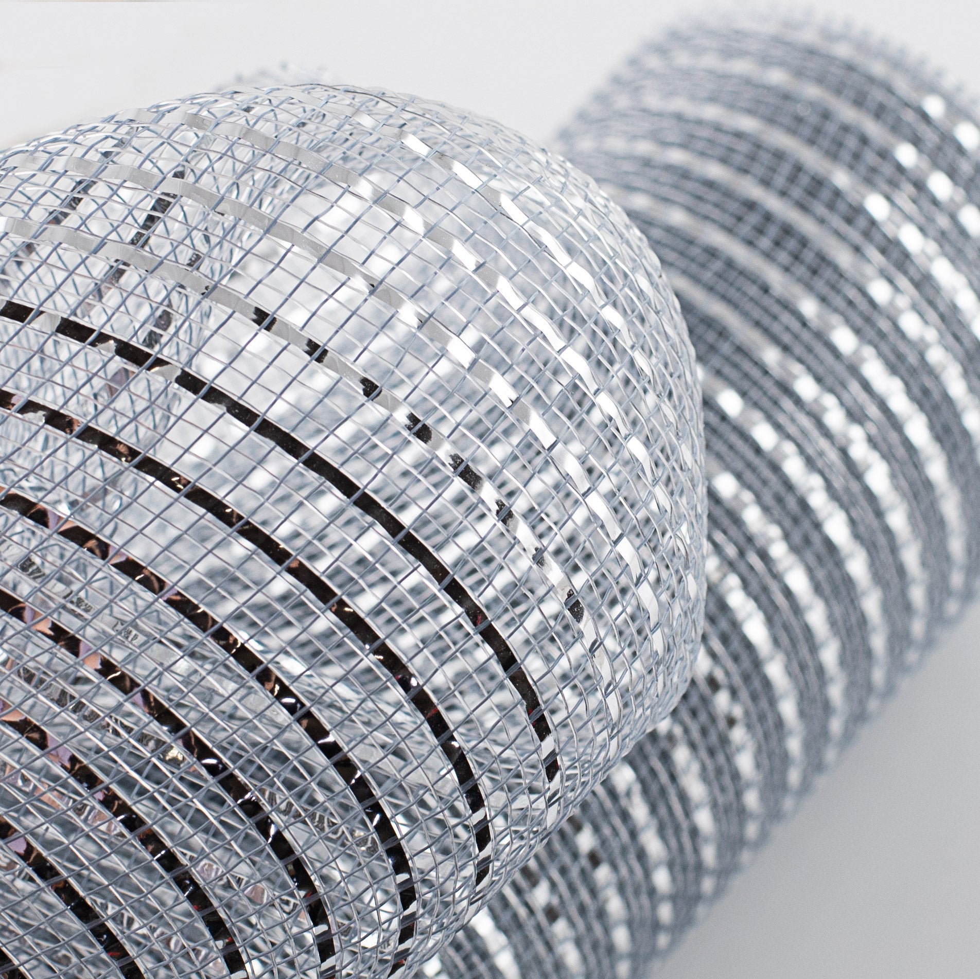 10" Poly Deco Mesh: Wide Foil Metallic Silver Lifestyle Photo