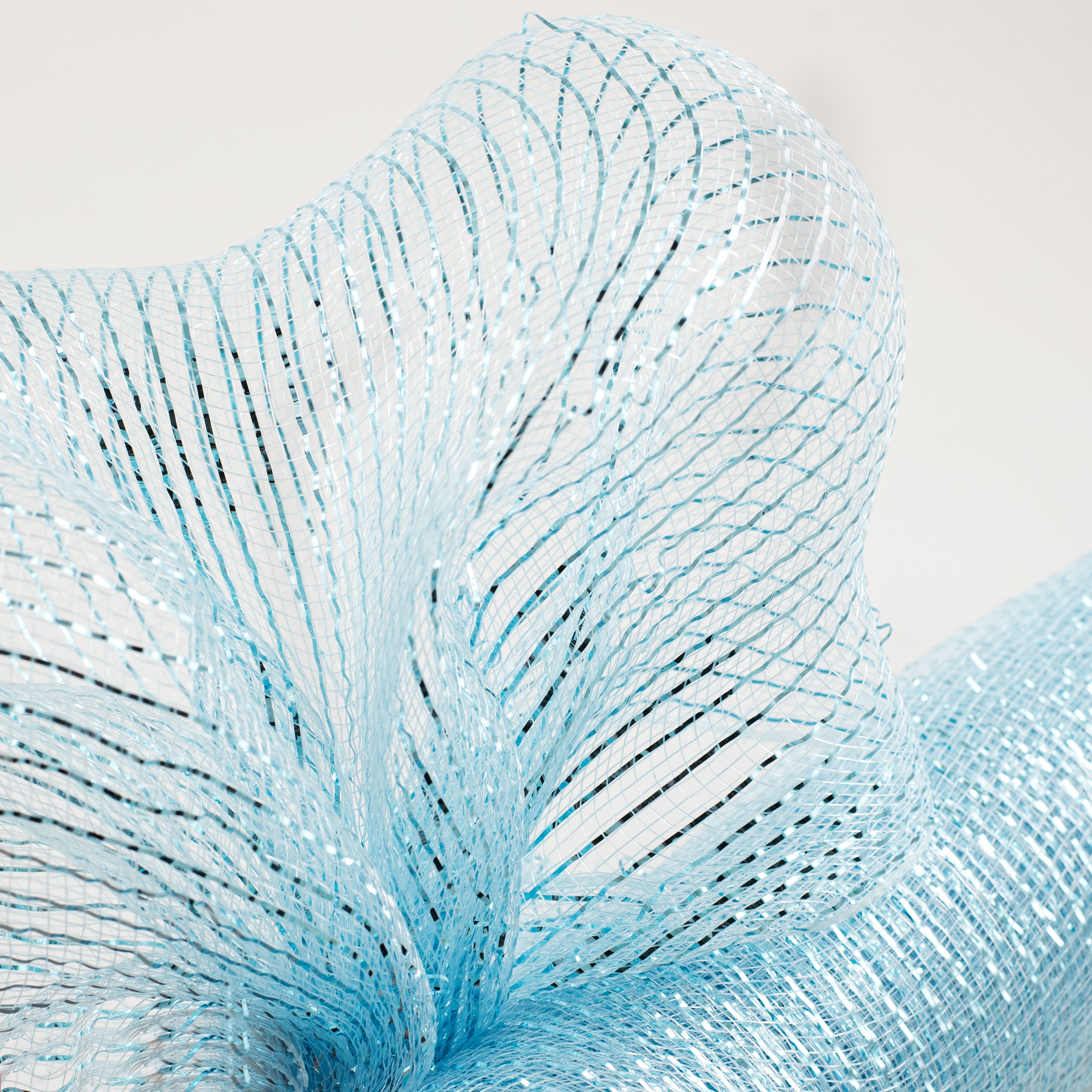 21" Poly Mesh Roll: Metallic Light Blue (10 Yards) Lifestyle Photo