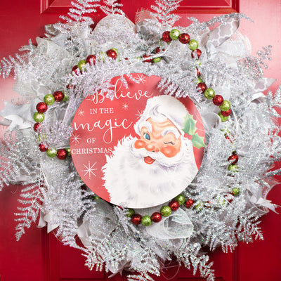12" Round Metal Sign: Cream Santa Believe Lifestyle Photo