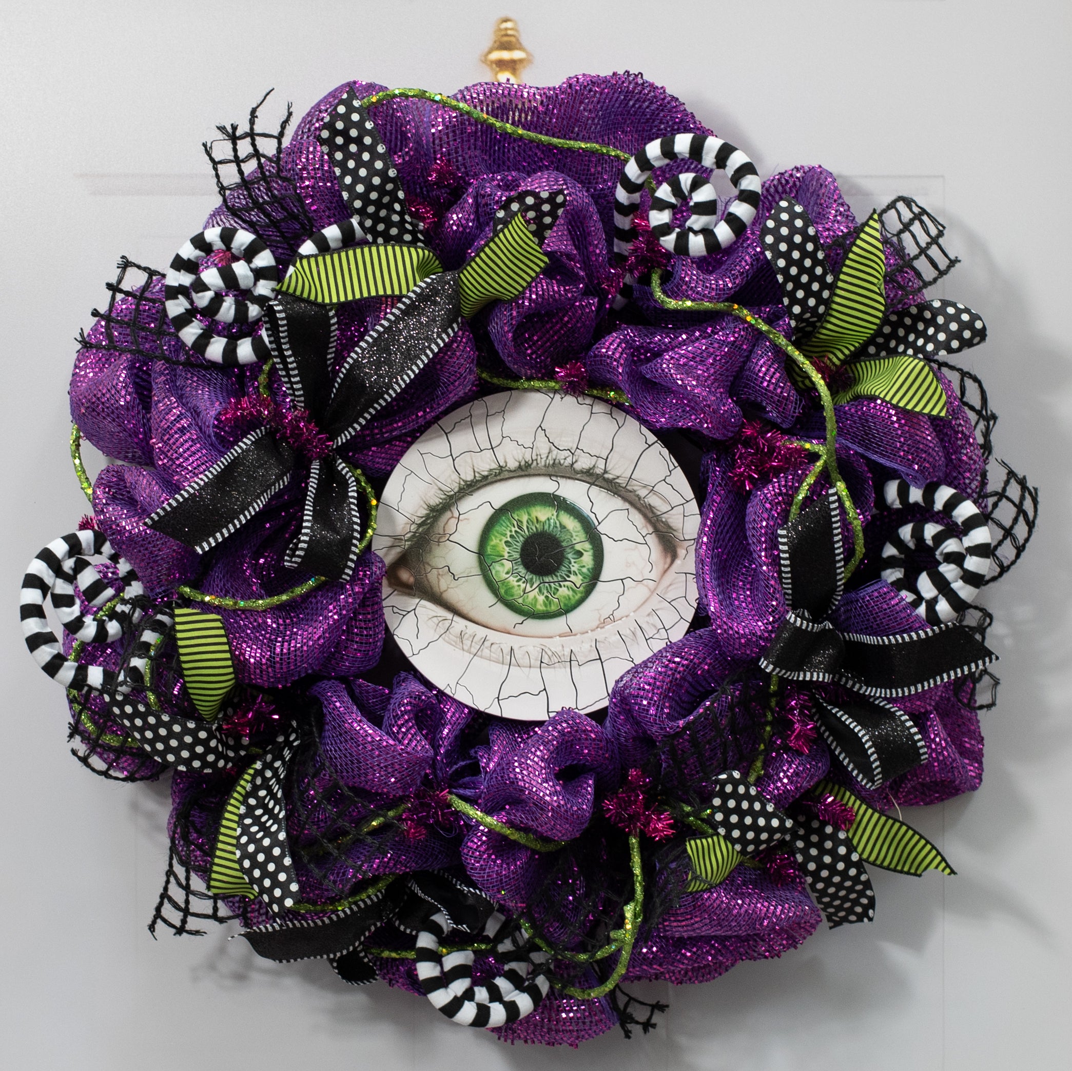 8.5" Round Waterproof Sign: Crackle Texture Creepy Eye Lifestyle Photo