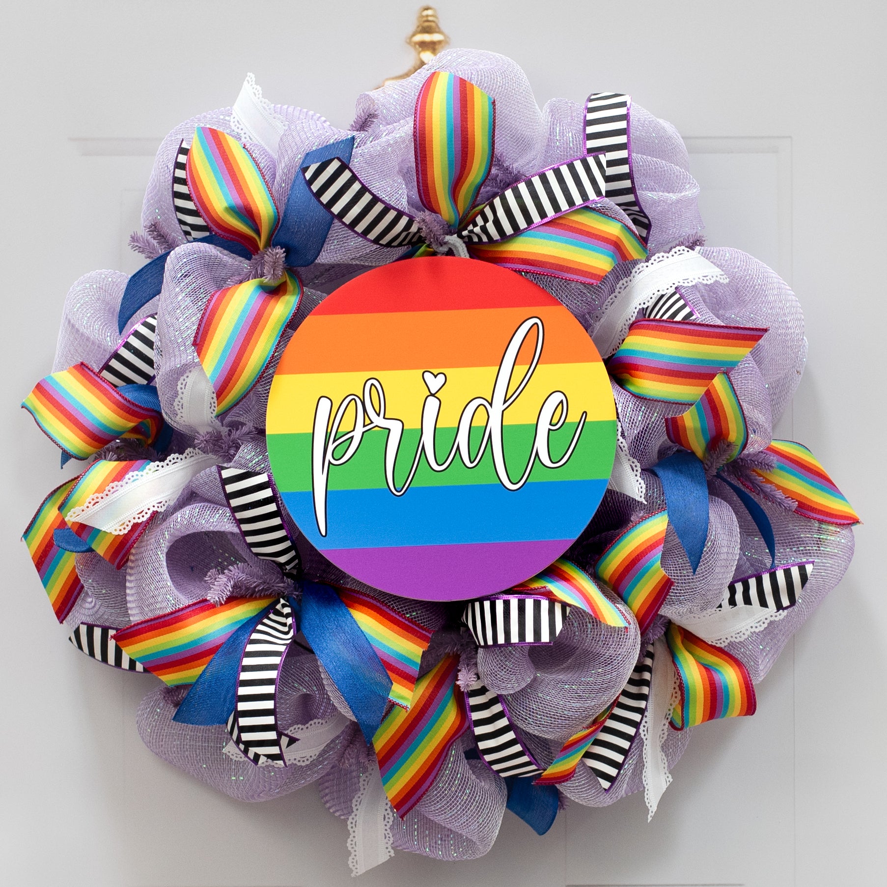10.5" Round Waterproof Accent Sign: Rainbow Pride Flag Lifestyle Photo