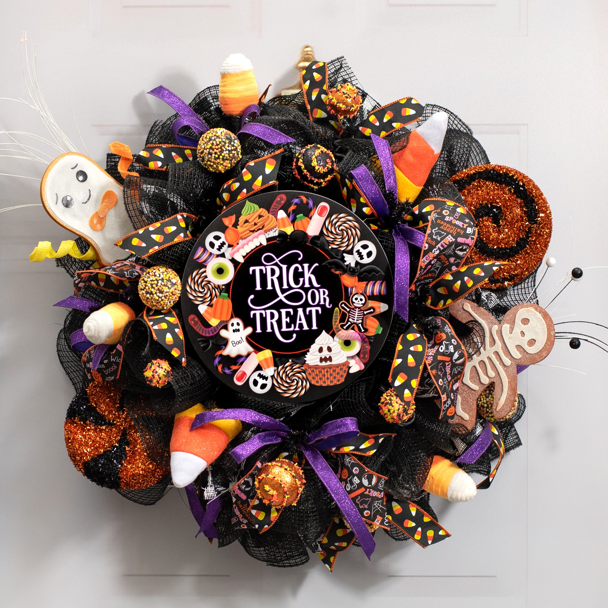 10.5" Round Waterproof Sign: Trick or Treat Candy Lifestyle Photo