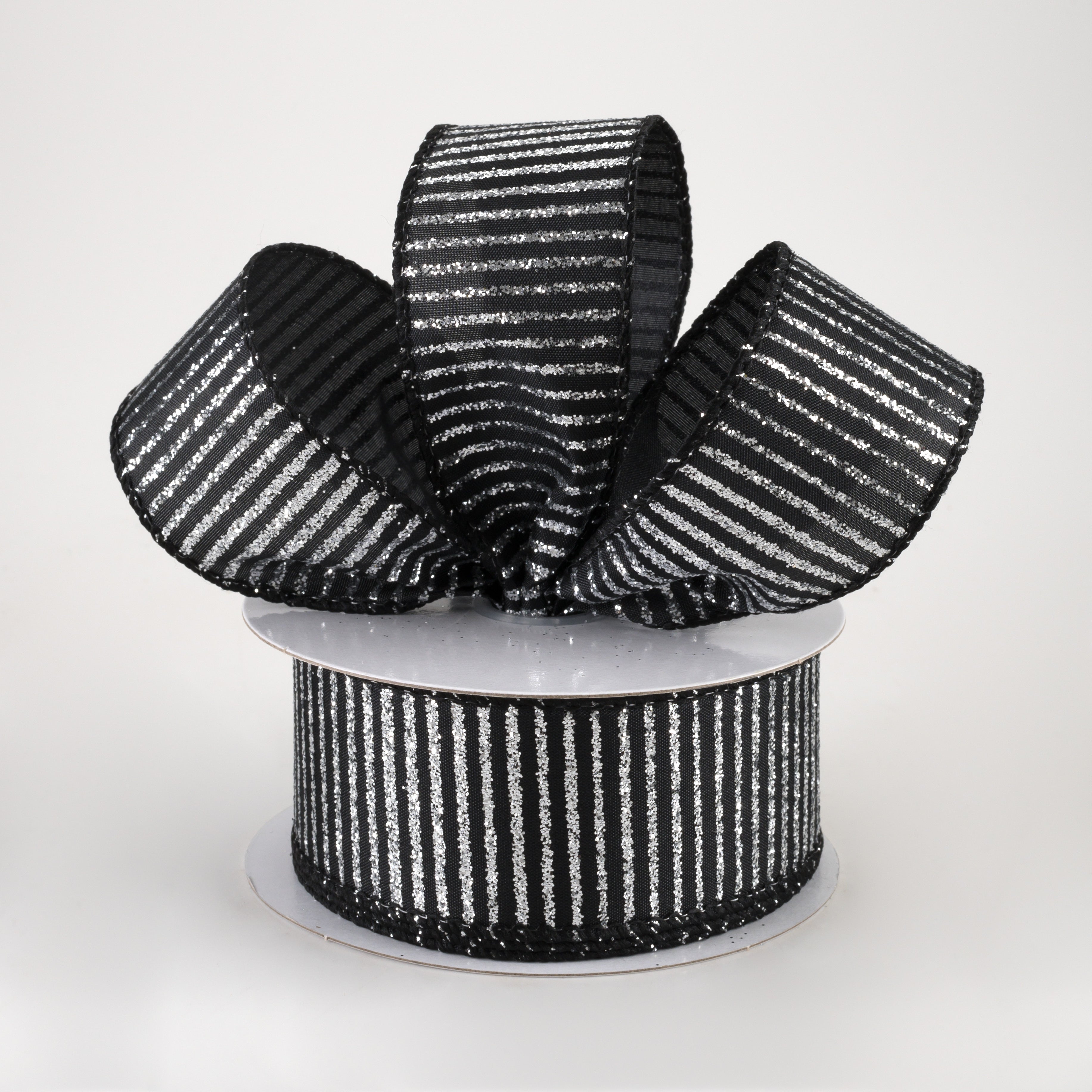 1.5" Satin Horizontal Glitter Stripe Ribbon: Silver on Black (10 Yards) Lifestyle Photo