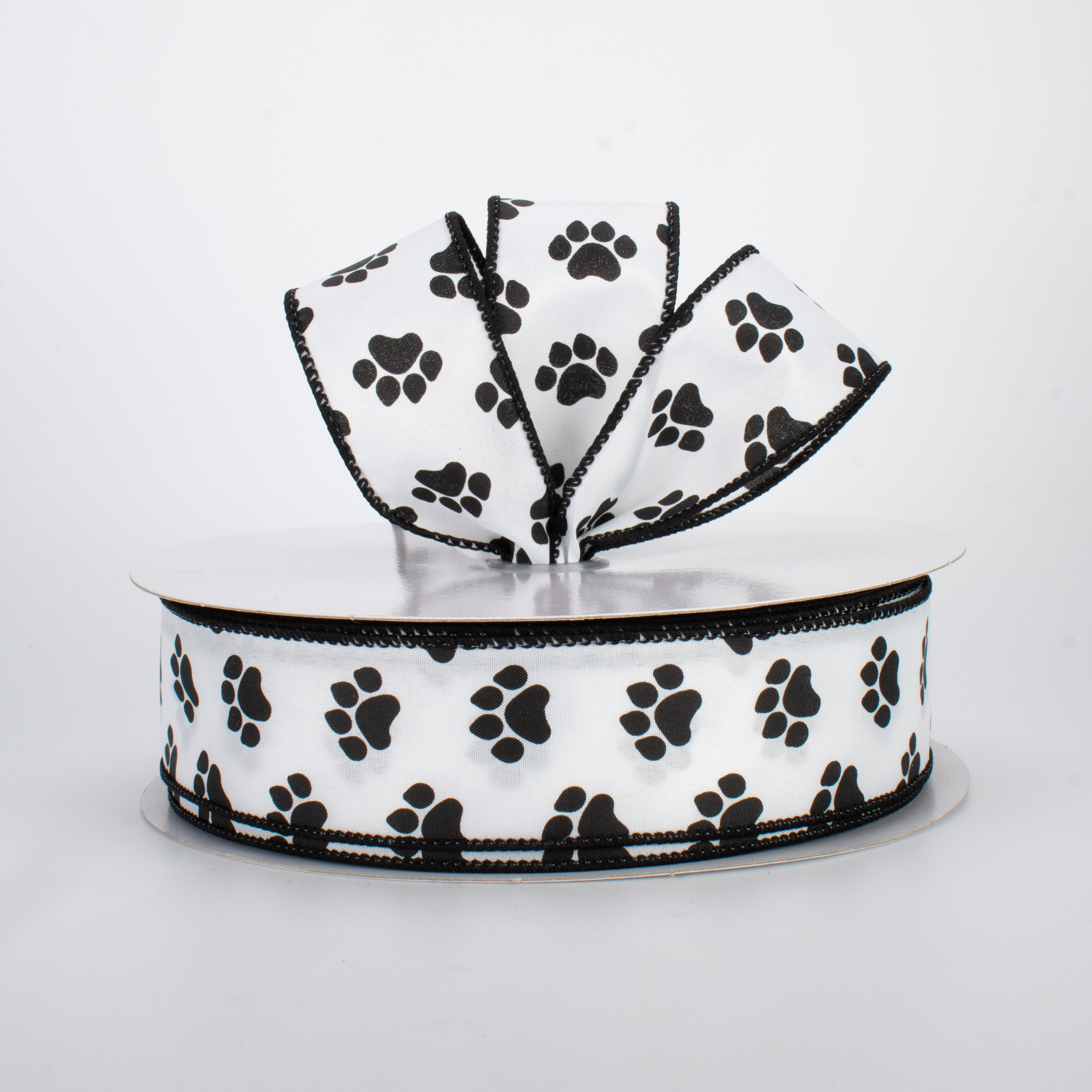 1.5" Satin Paw Print Ribbon: Black & White (50 Yards) Lifestyle Photo