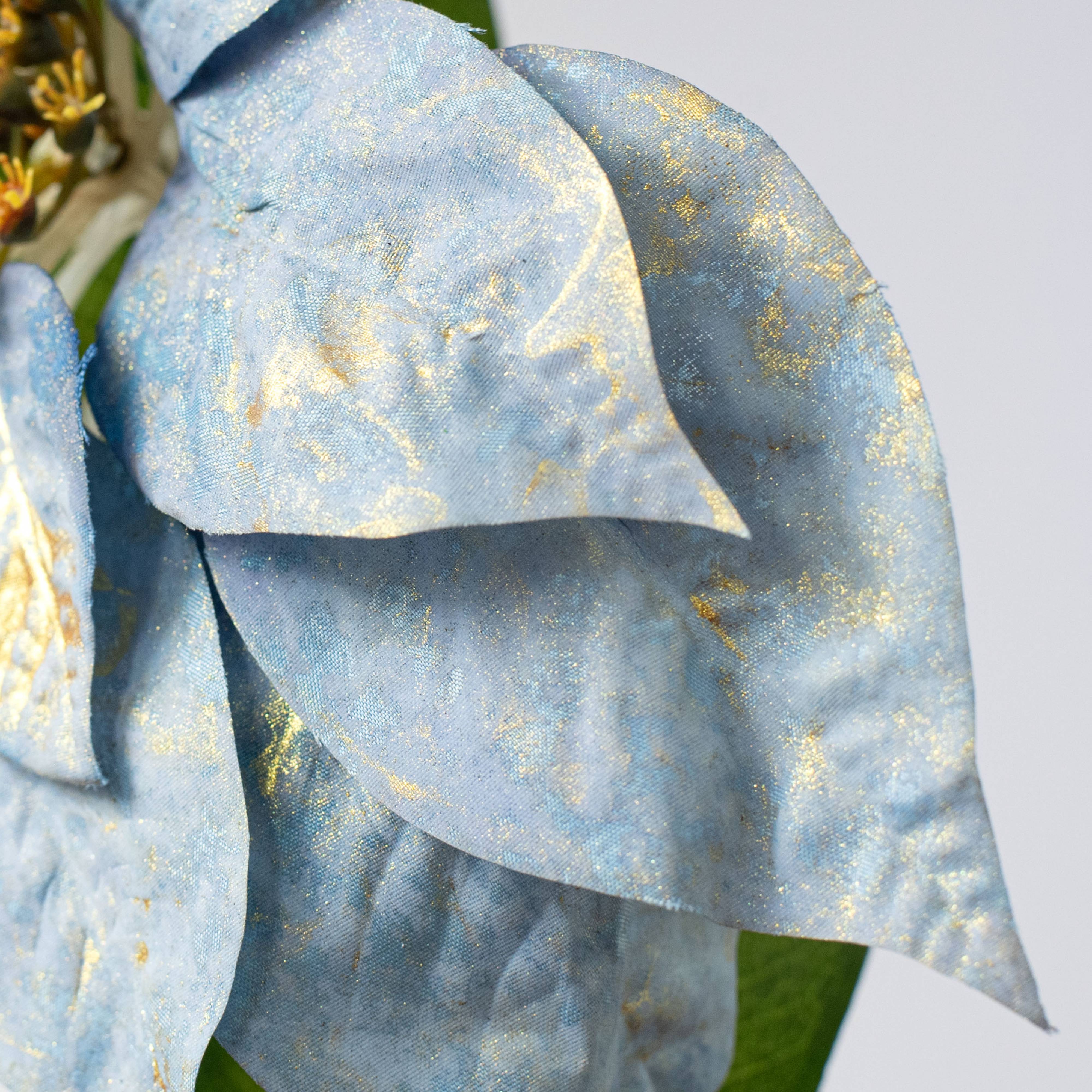 13" x 28" Silk Poinsettia Stem: Blue & Gold Lifestyle Photo