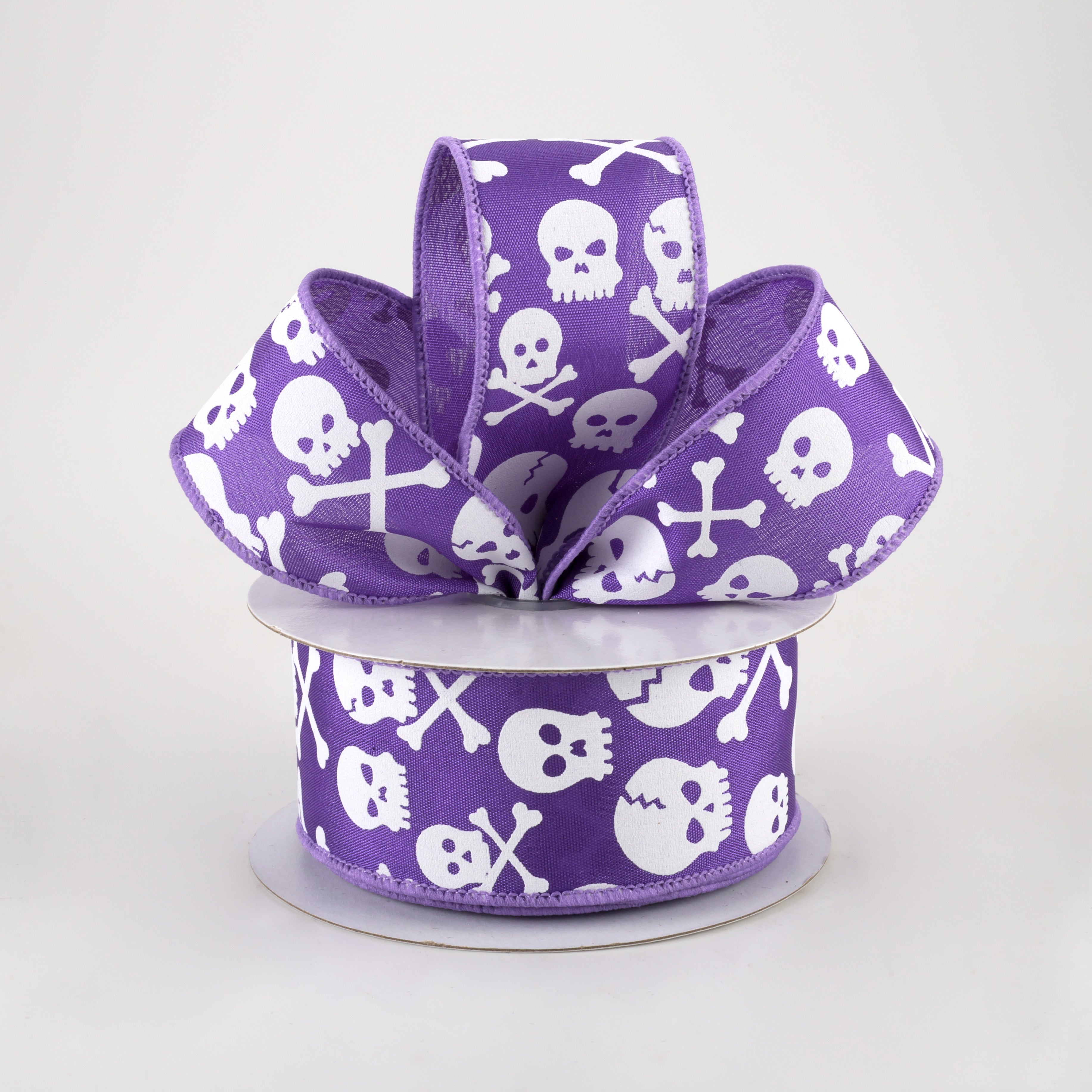 1.5" Skull and Crossbones Ribbon: Purple & White (10 Yards) Lifestyle Photo
