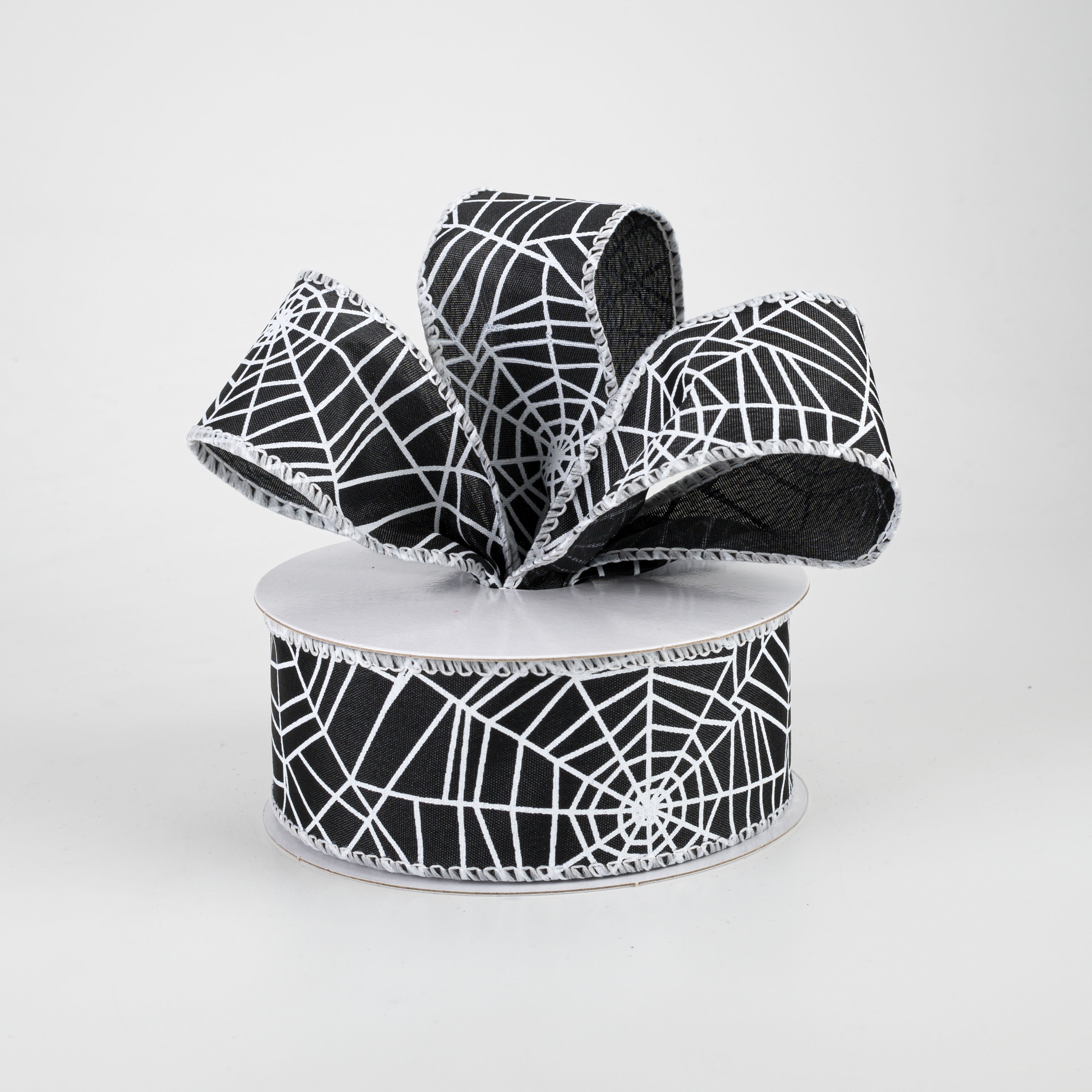 1.5" Spider Web Satin Ribbon: Black (10 Yards) Lifestyle Photo