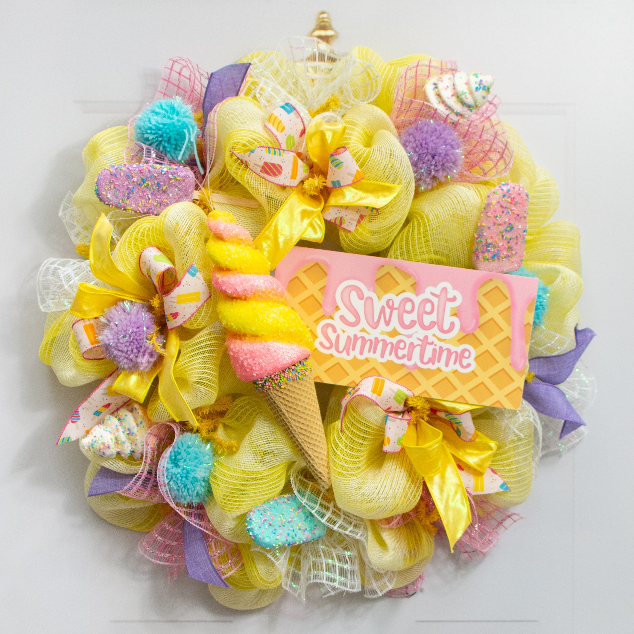 13" Swirl Ice Cream Cone Ornament: Pink & Yellow Lifestyle Photo