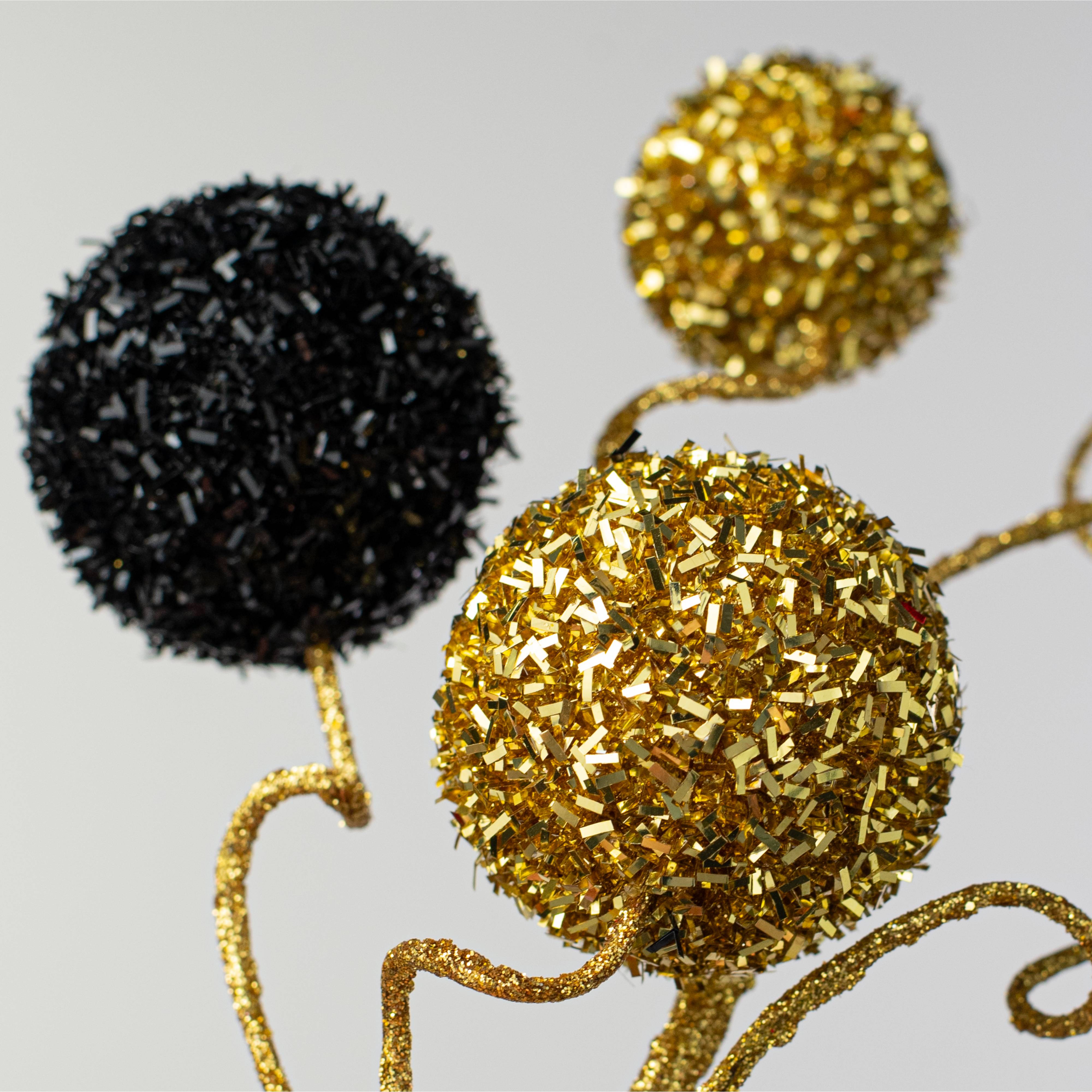 20" V-Cut Foil Ball Spray: Black & Gold Lifestyle Photo