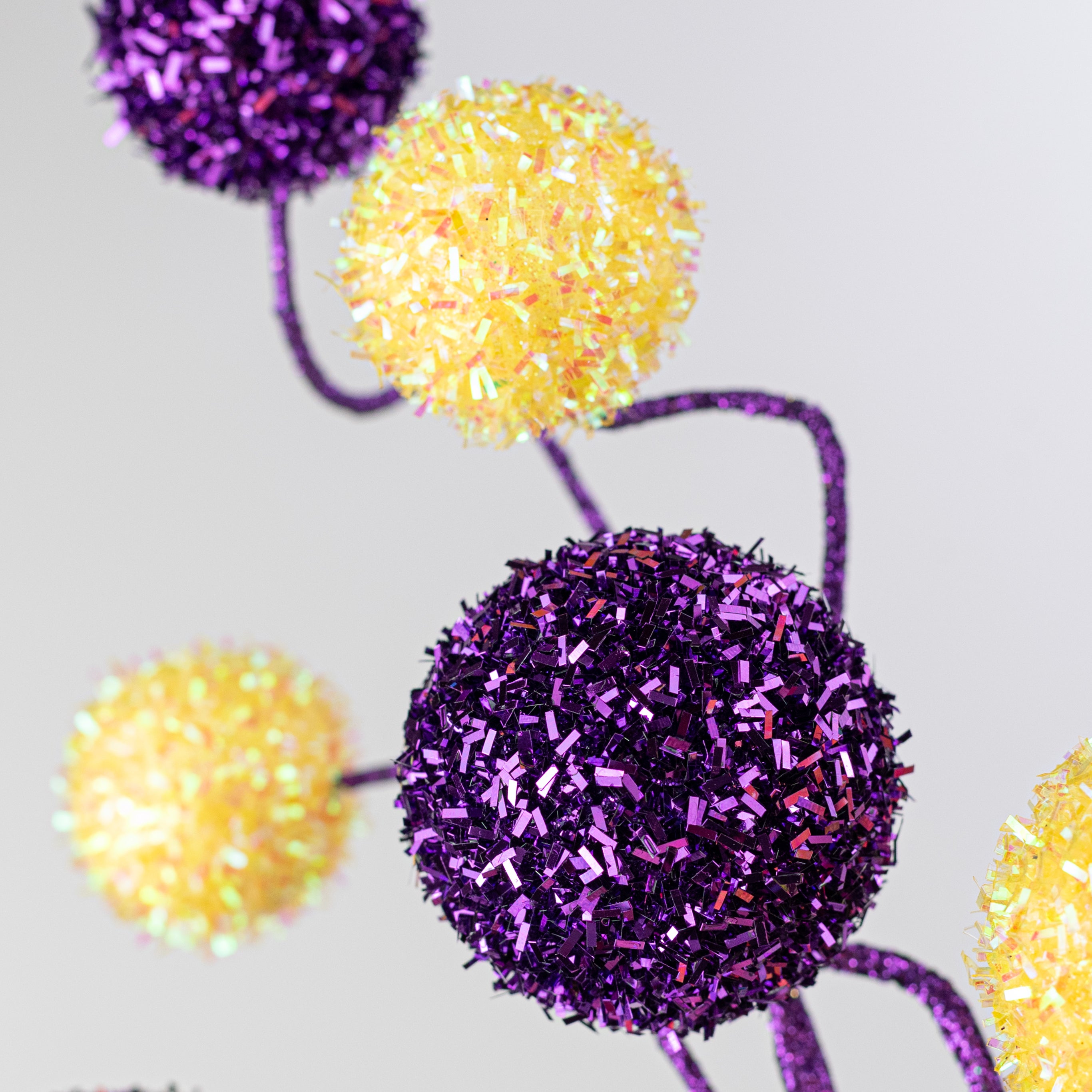 20" V-Cut Foil Ball Spray: Purple & Golden Yellow Lifestyle Photo