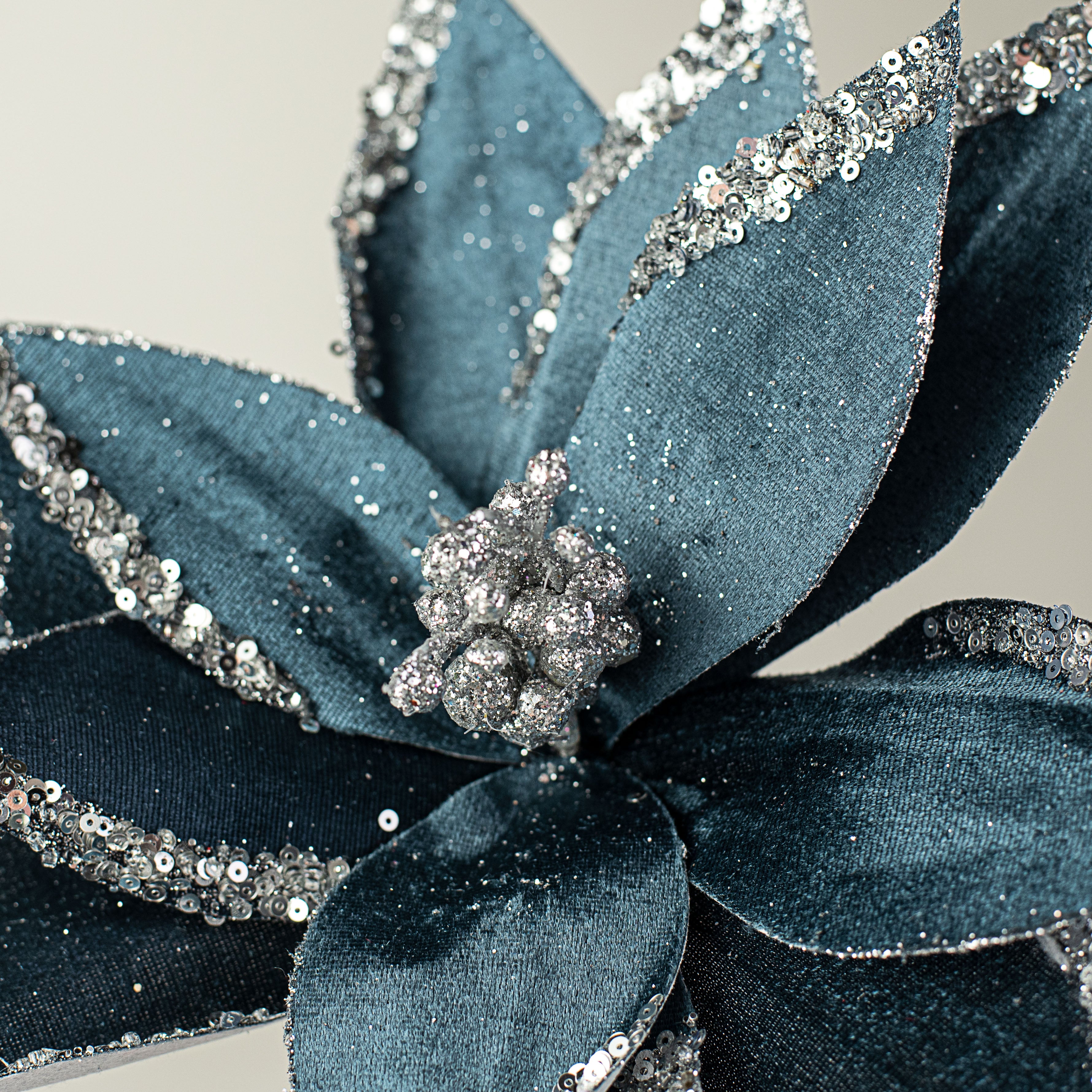 22" Velvet Glitter Poinsettia Stem: Blue Lifestyle Photo
