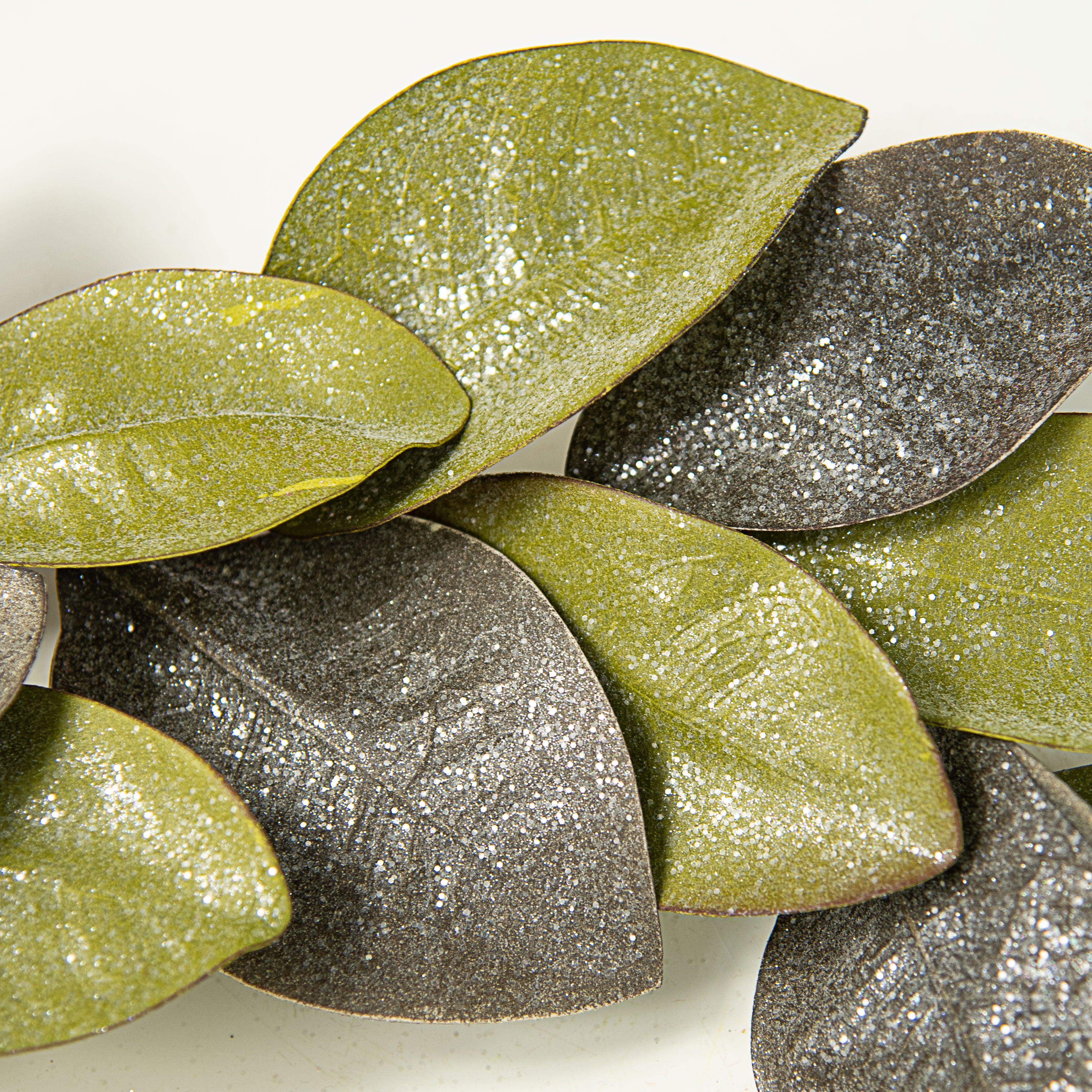 4' Vintage Glitter Magnolia Leaves Garland: Two Tone Green Lifestyle Photo