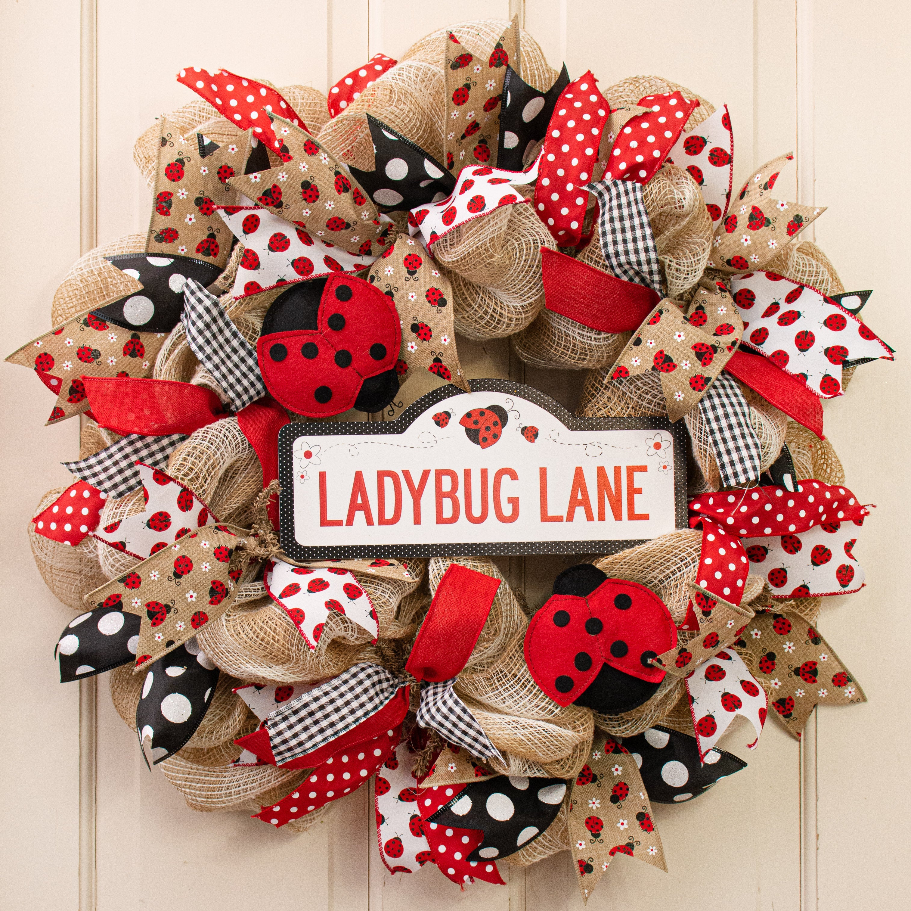 12" Waterproof Sign: Ladybug Lane Lifestyle Photo