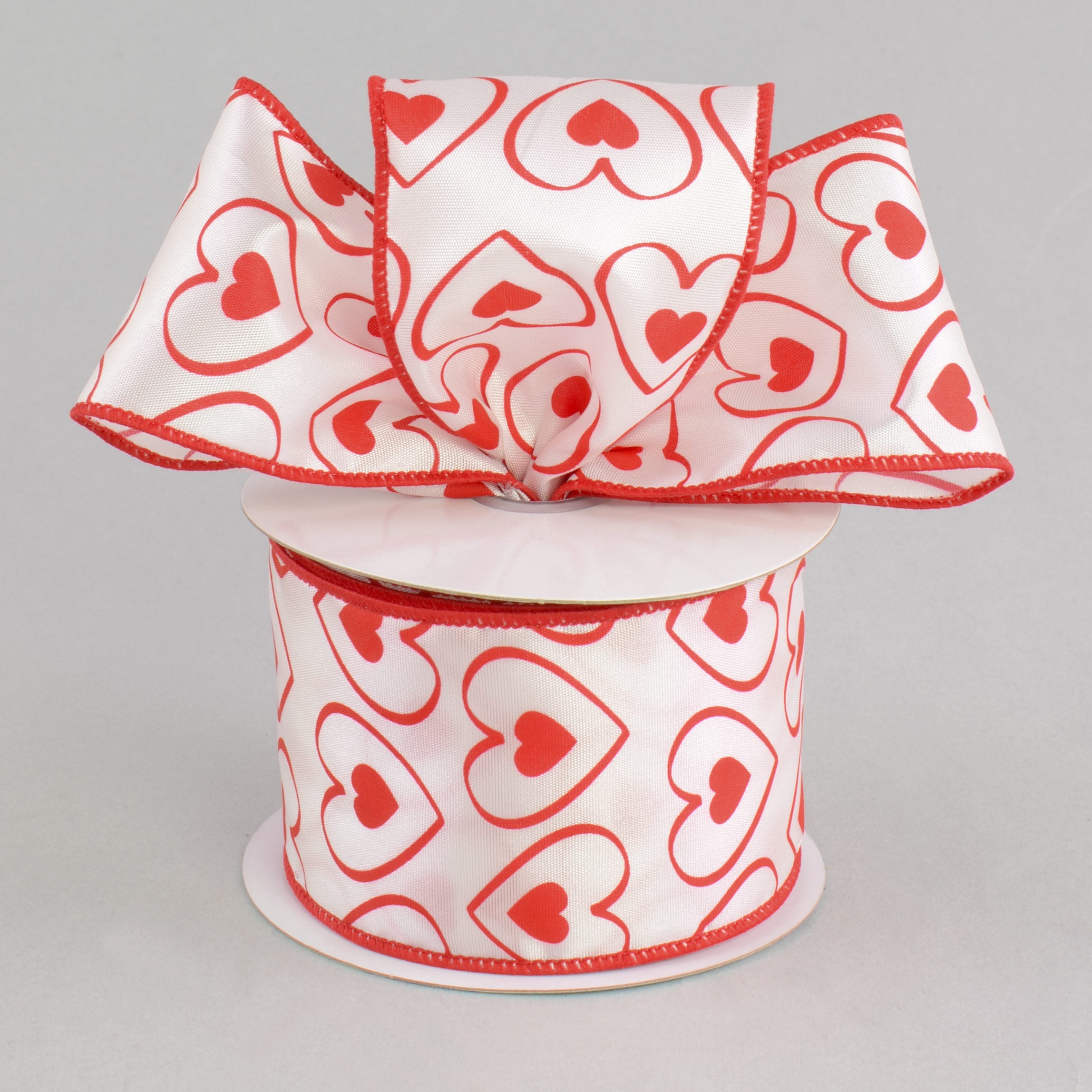 2.5" White Satin Red Heart Within Heart Ribbon (10 Yards) Lifestyle Photo