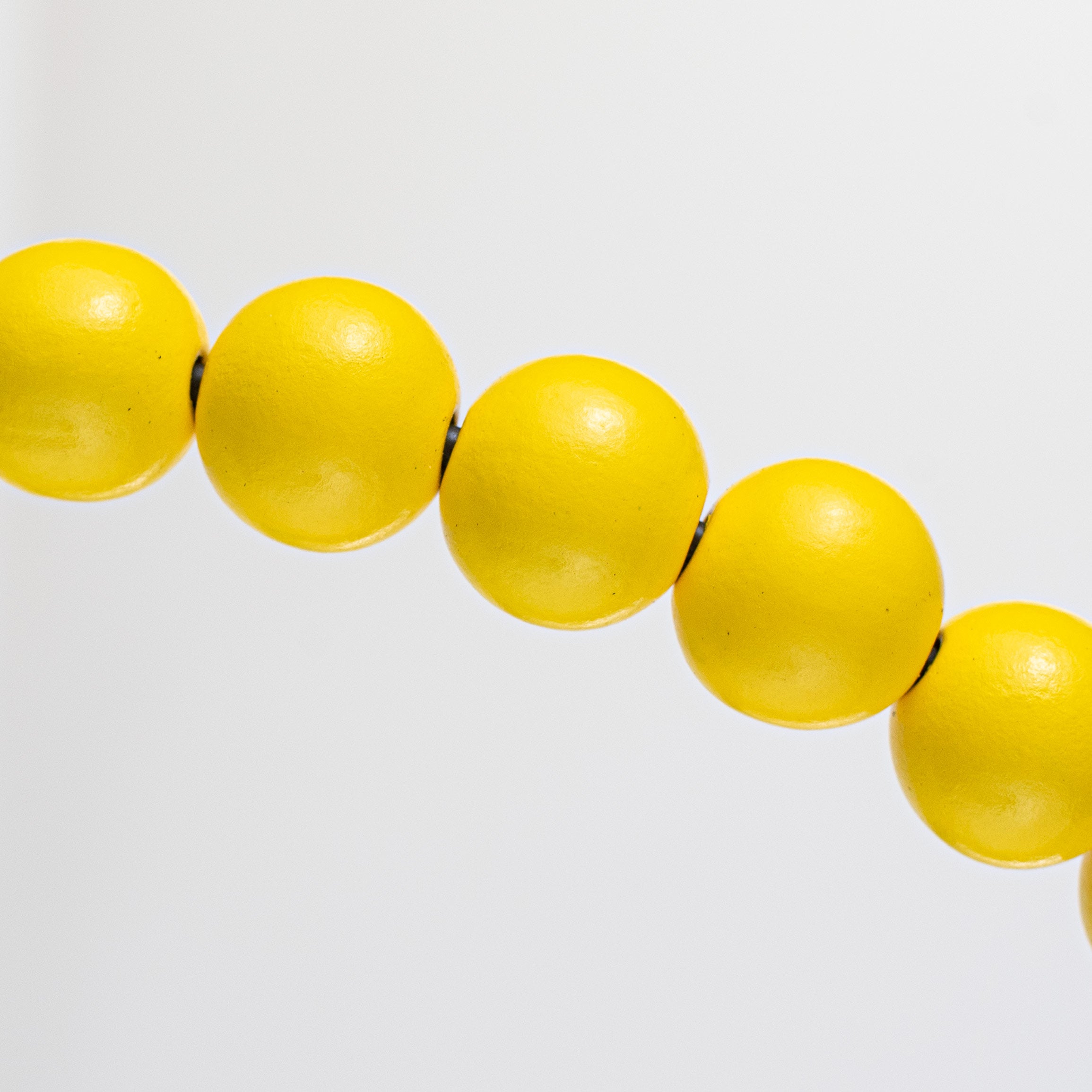13" Wood Bead Wreath: Bright Yellow detail photo 3
