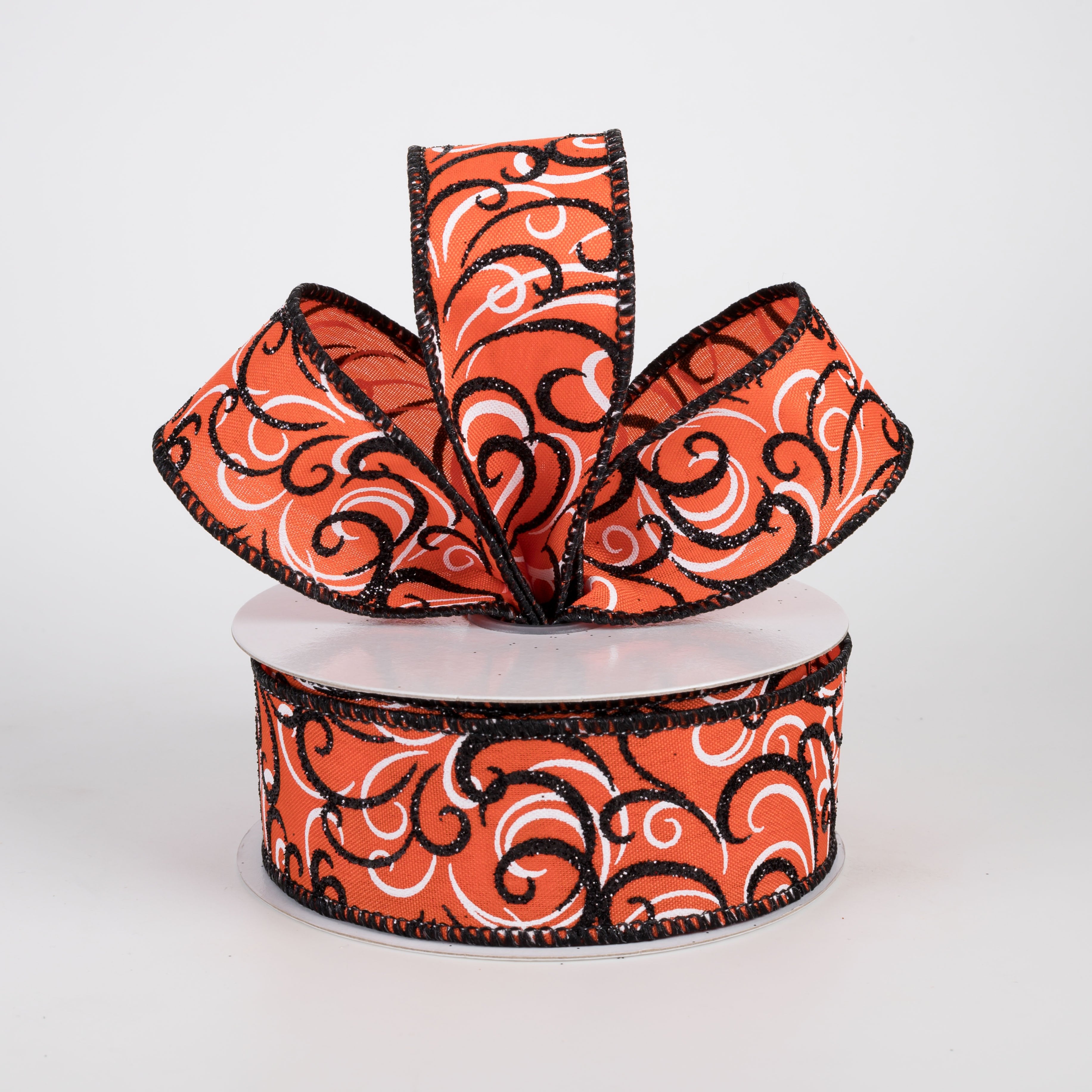 1.5" Glittered Multi Swirls Ribbon: Black & White on Orange (10 Yards) Lifestyle Photo
