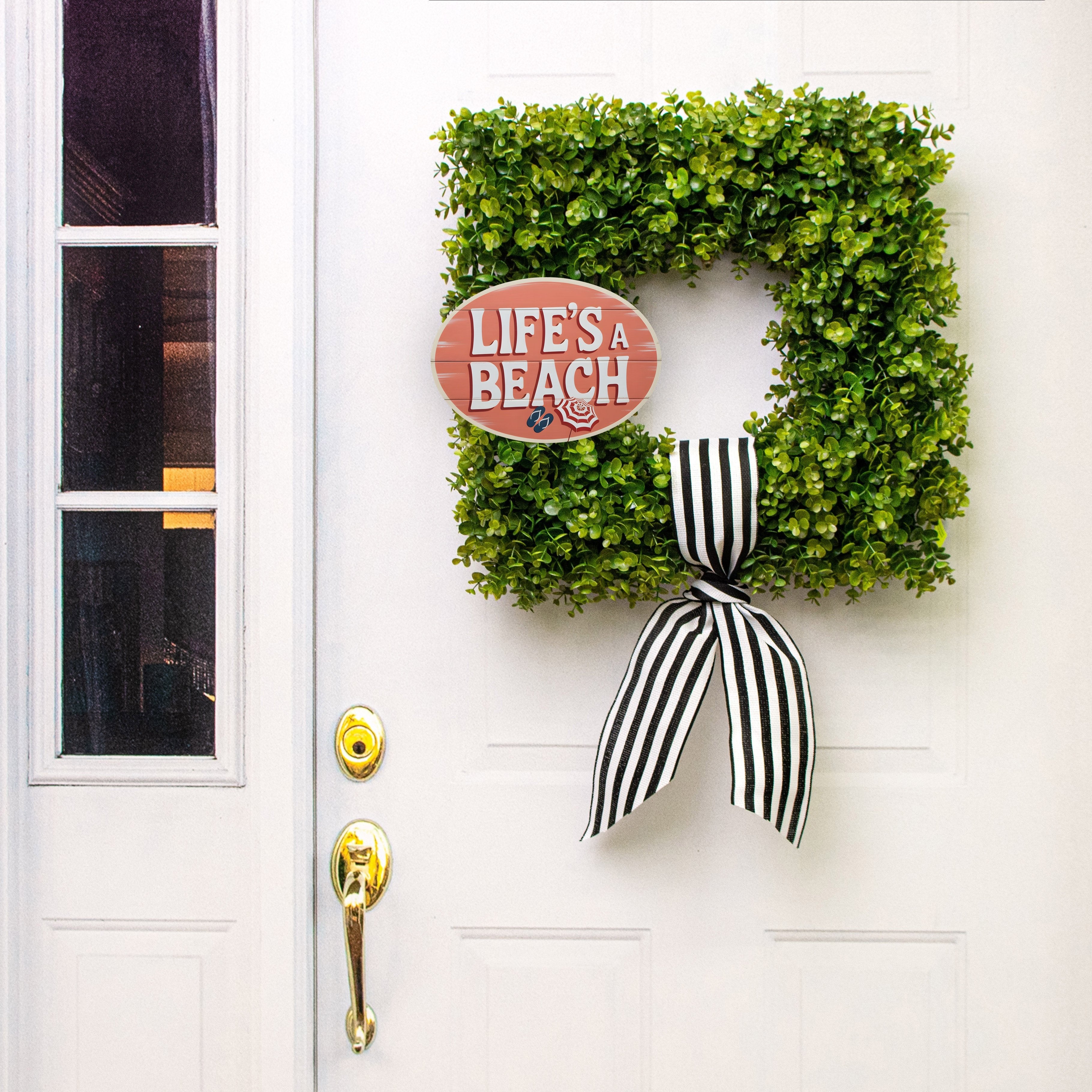 10.5" Oval Waterproof Sign: Life's a Beach Flip Flops and Umbrella Lifestyle Photo