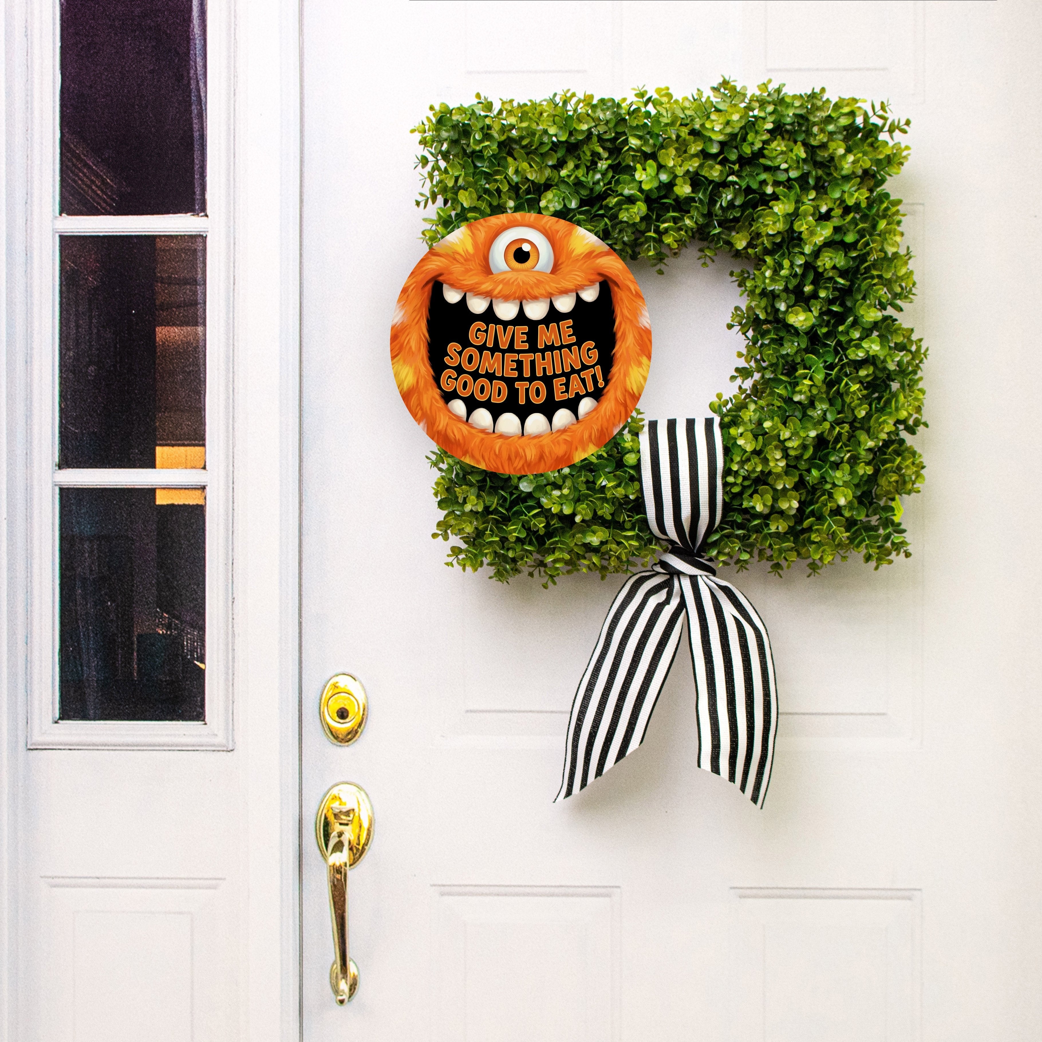  10.5" Round Waterproof Sign: Something Good To Eat Orange Monster Lifestyle Photo