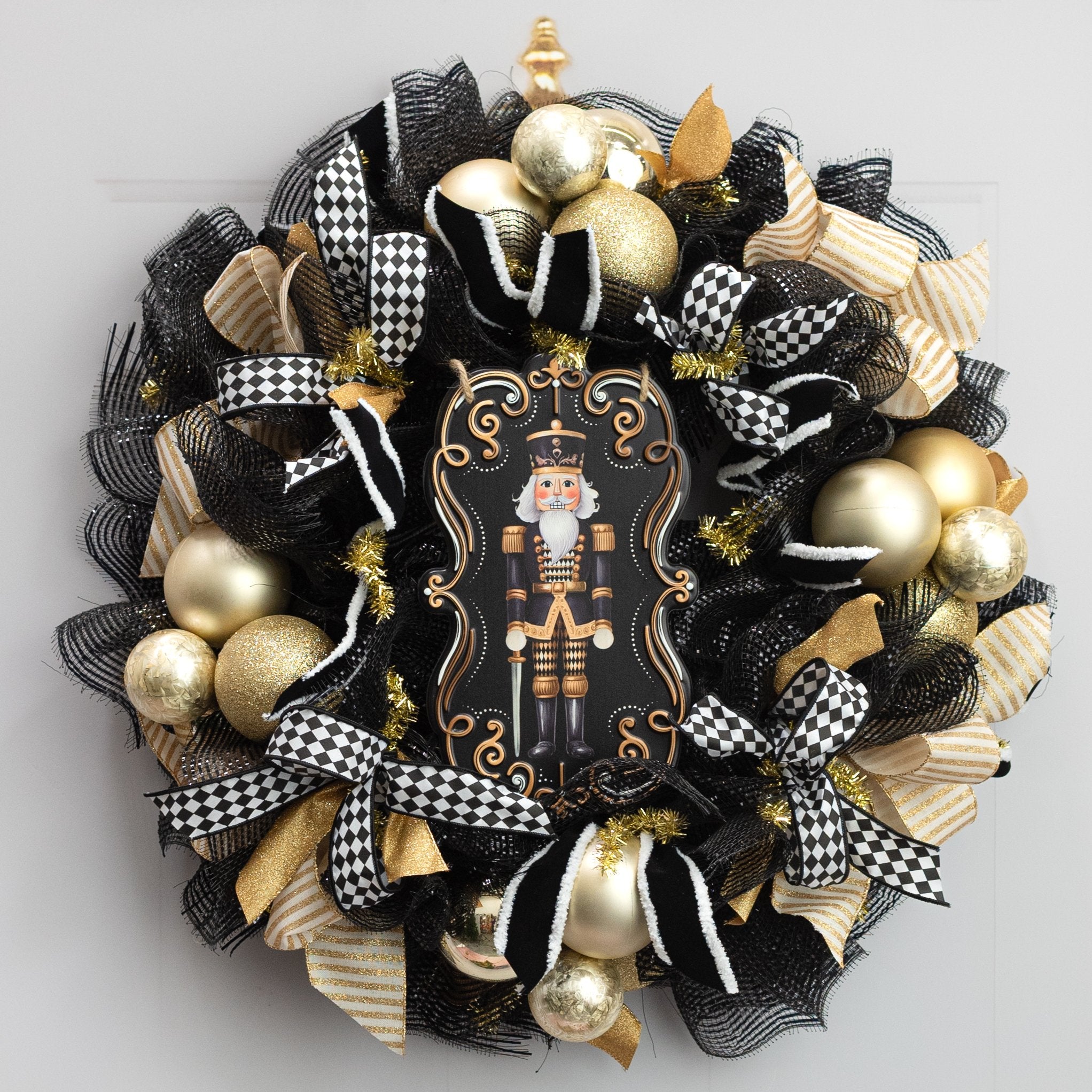 11.5" Metal Embossed Hanger: Harlequin Nutcracker Lifestyle Photo