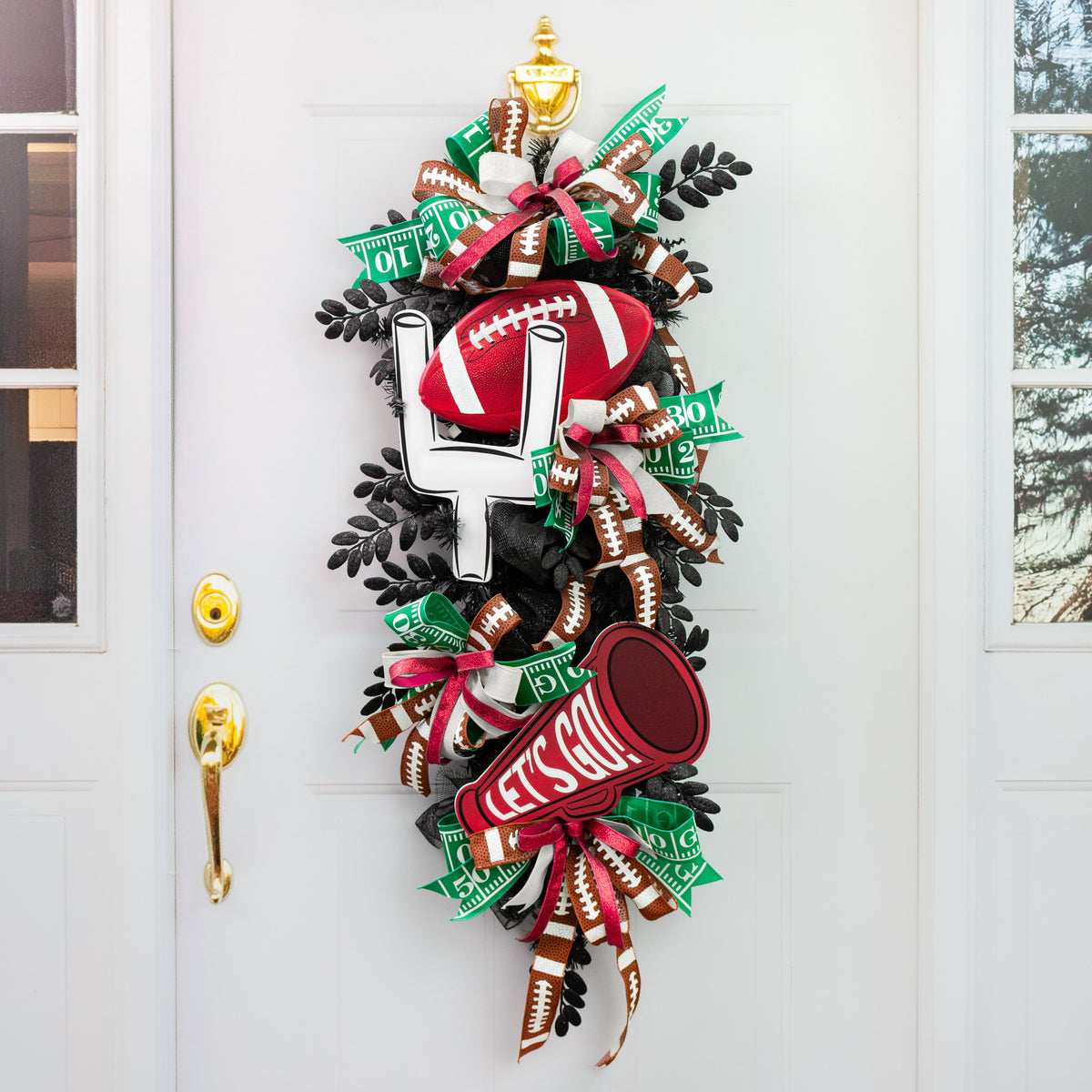 11" Embossed Metal Football Sign: Crimson & White Lifestyle Photo