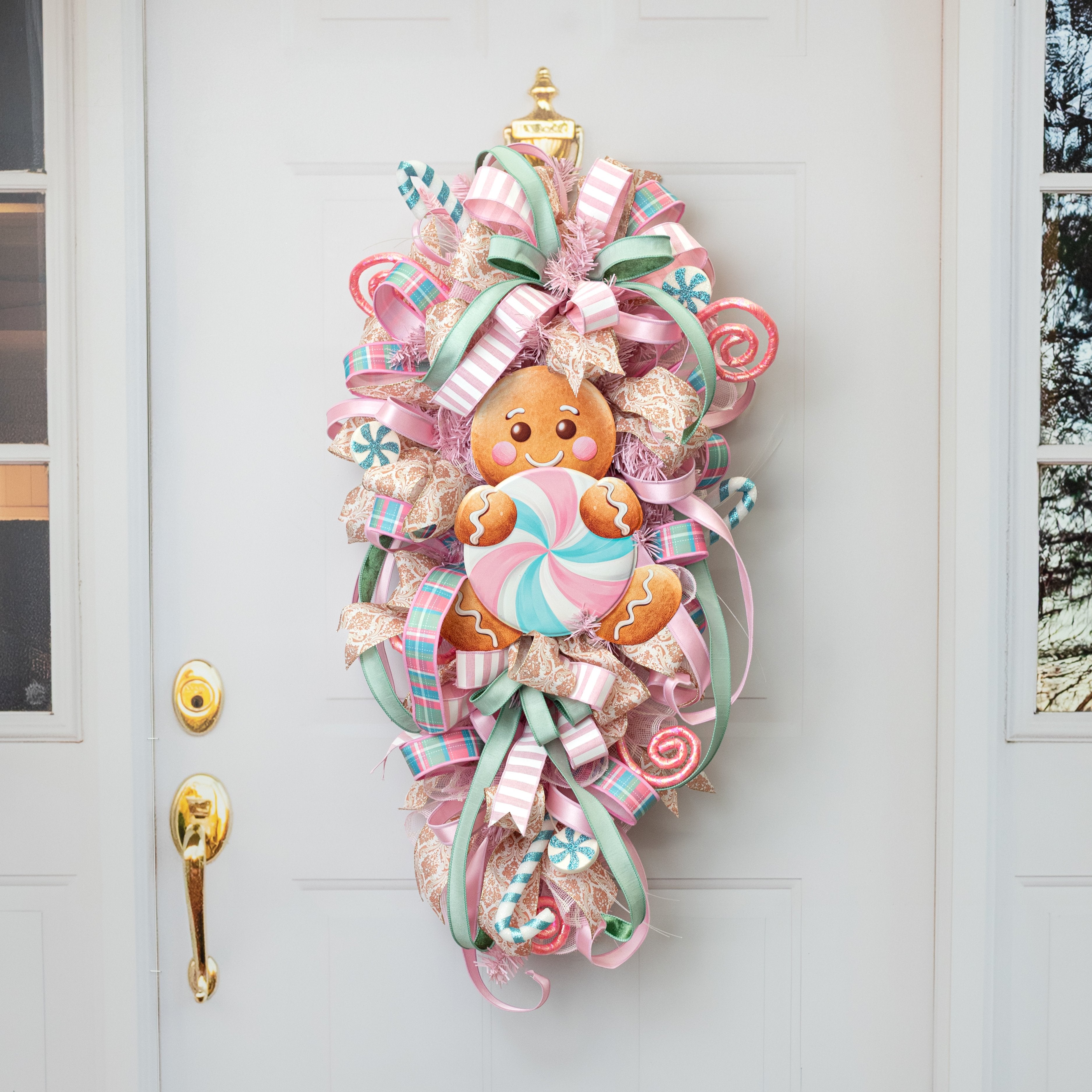 12" Metal Embossed Gingerbread Man Hanger: Pink Peppermint Lifestyle Photo