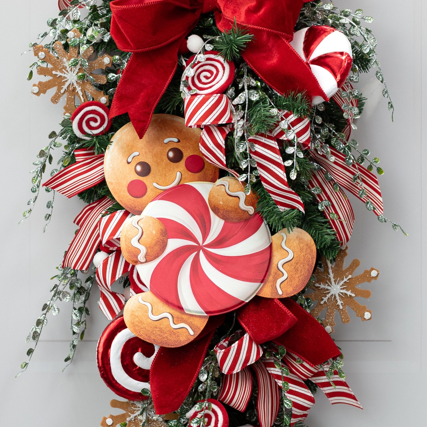 12" Metal Embossed Gingerbread Man Hanger: Red Peppermint Lifestyle Photo
