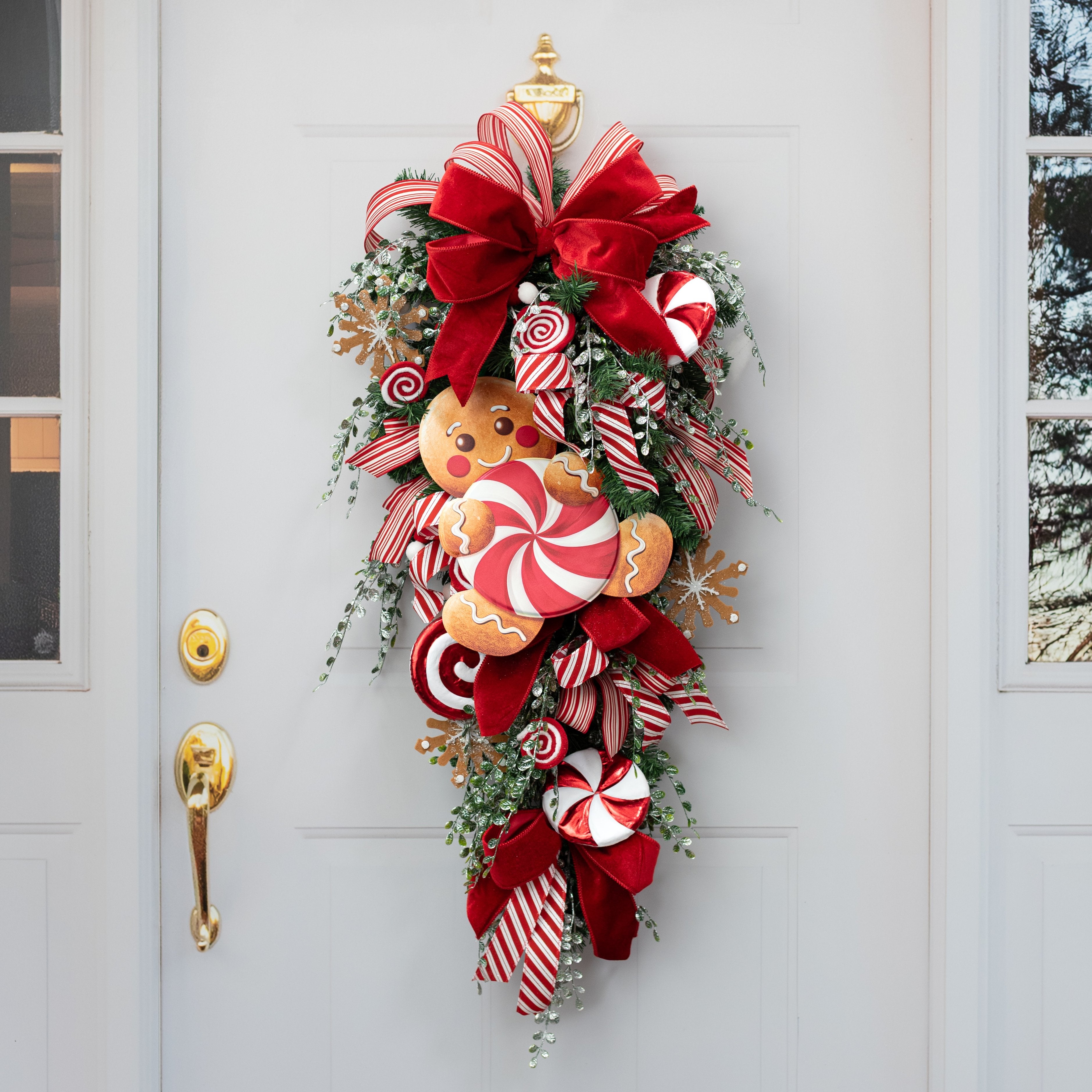 12" Metal Embossed Gingerbread Man Hanger: Red Peppermint detail photo 4