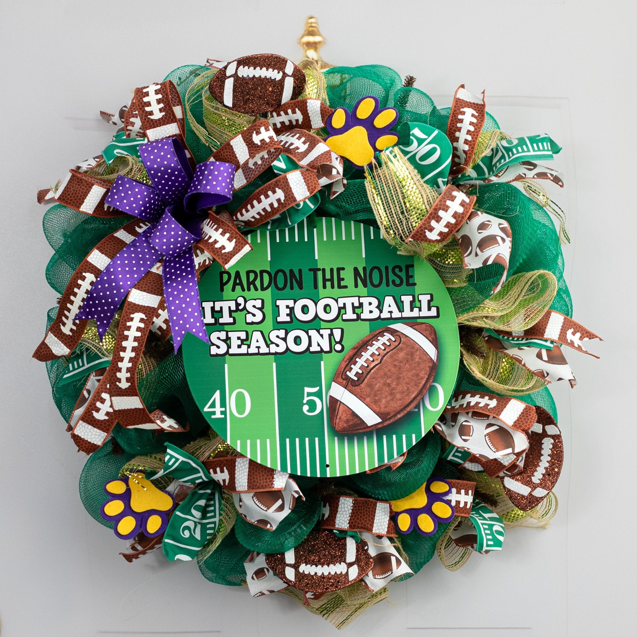 12" Round Metal Sign: Pardon Noise Football Season Lifestyle Photo